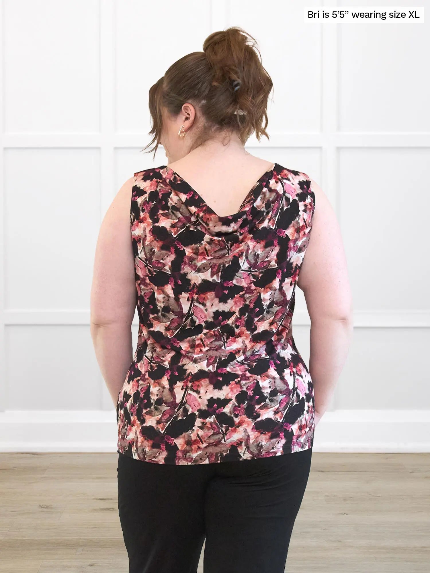 Miik model Bri (5’5”, xlarge) standing with her back towards the camera showing the back of Miik&