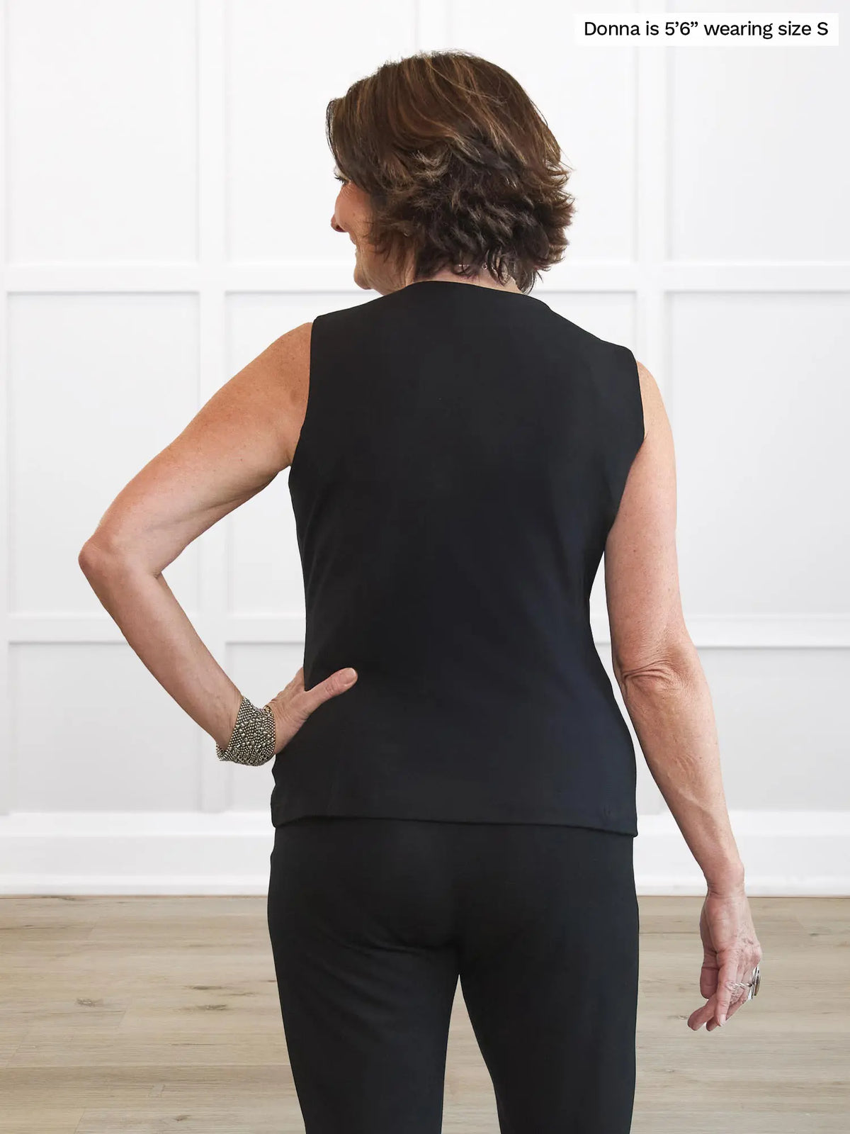 Miik founder Donna (5’6”, small) standing with her back towards the camera showing the back of Miik&