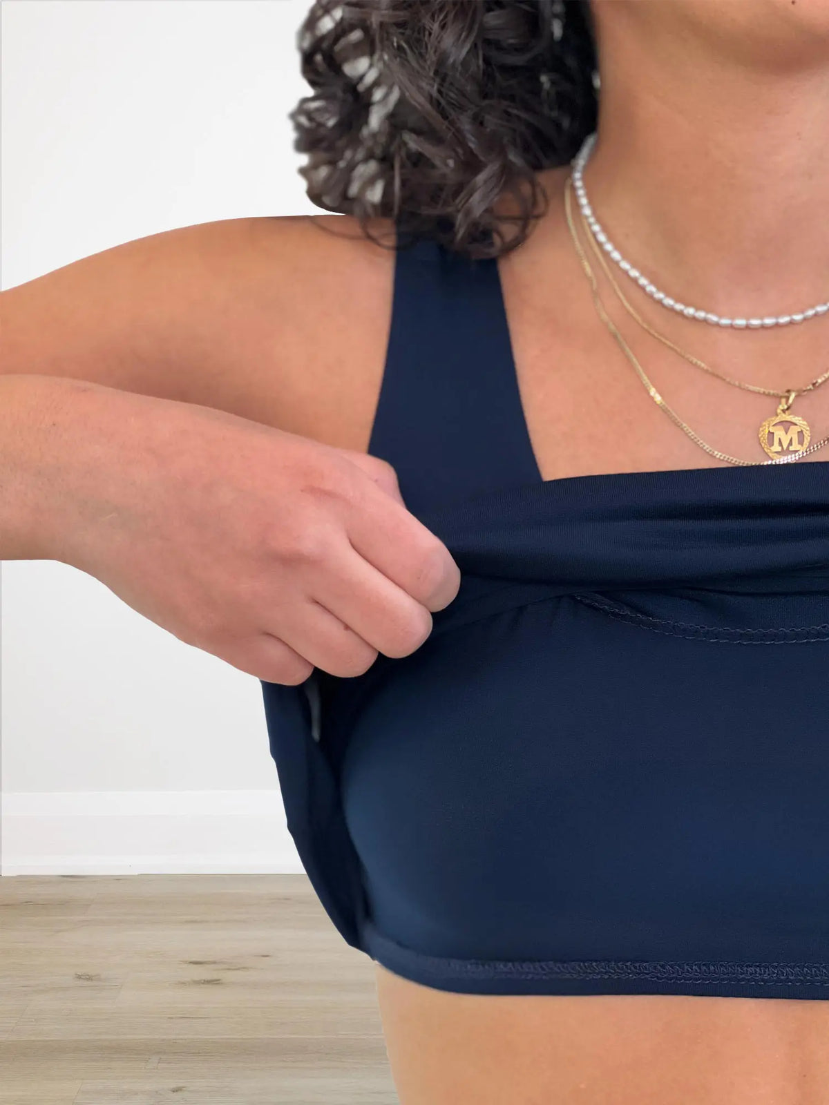 A closeup of the built-in shelf bra layer of Miik&