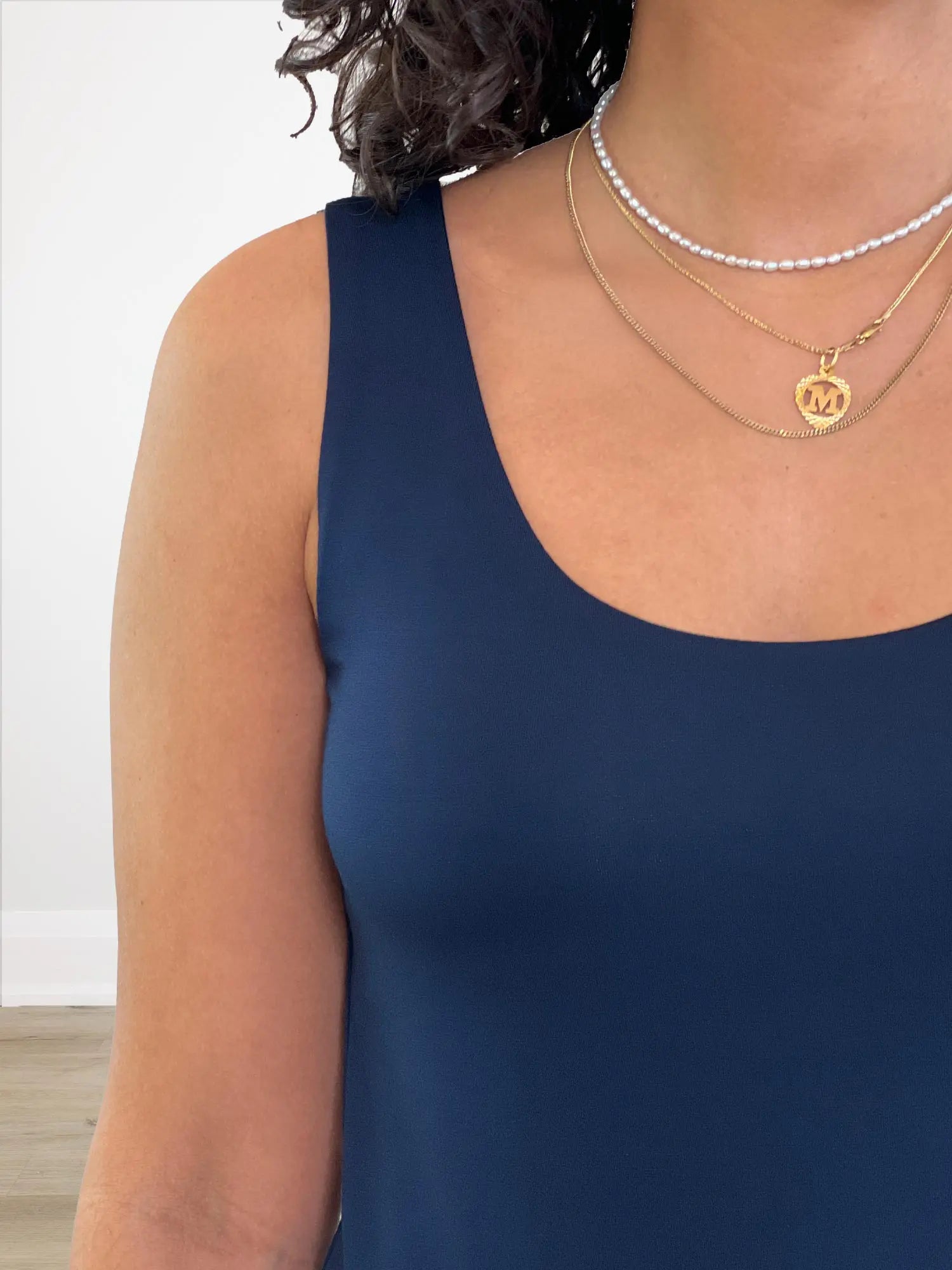 A closeup of the scoop neckline of Miik&