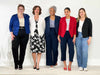 Miik models and founder Donna all smiling and showing the different colours and ways of styling the new Miik's Dorit boxy soft blazer. Bri is wearing in ink blue colour, Donna in white, Keethai in navy, Meron in poppy red and Christal in black 