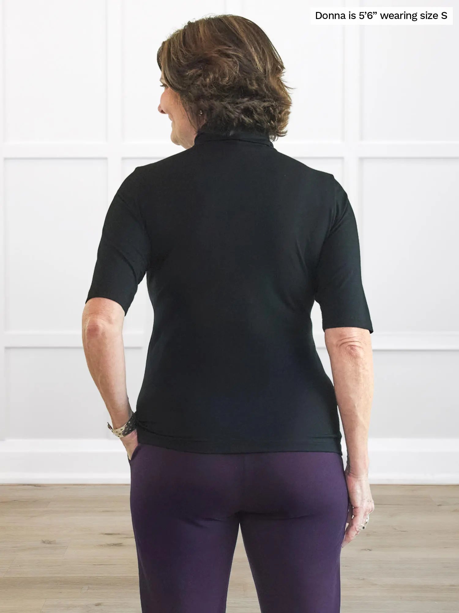 Miik founder Donna (5’6”, small) standing with her back towards the camera showing the back of Miik&