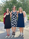 Miik model Yasmine, Christal and founder Donna smiling all wearing the same dress: Miik's Jaaron reversible tank dress