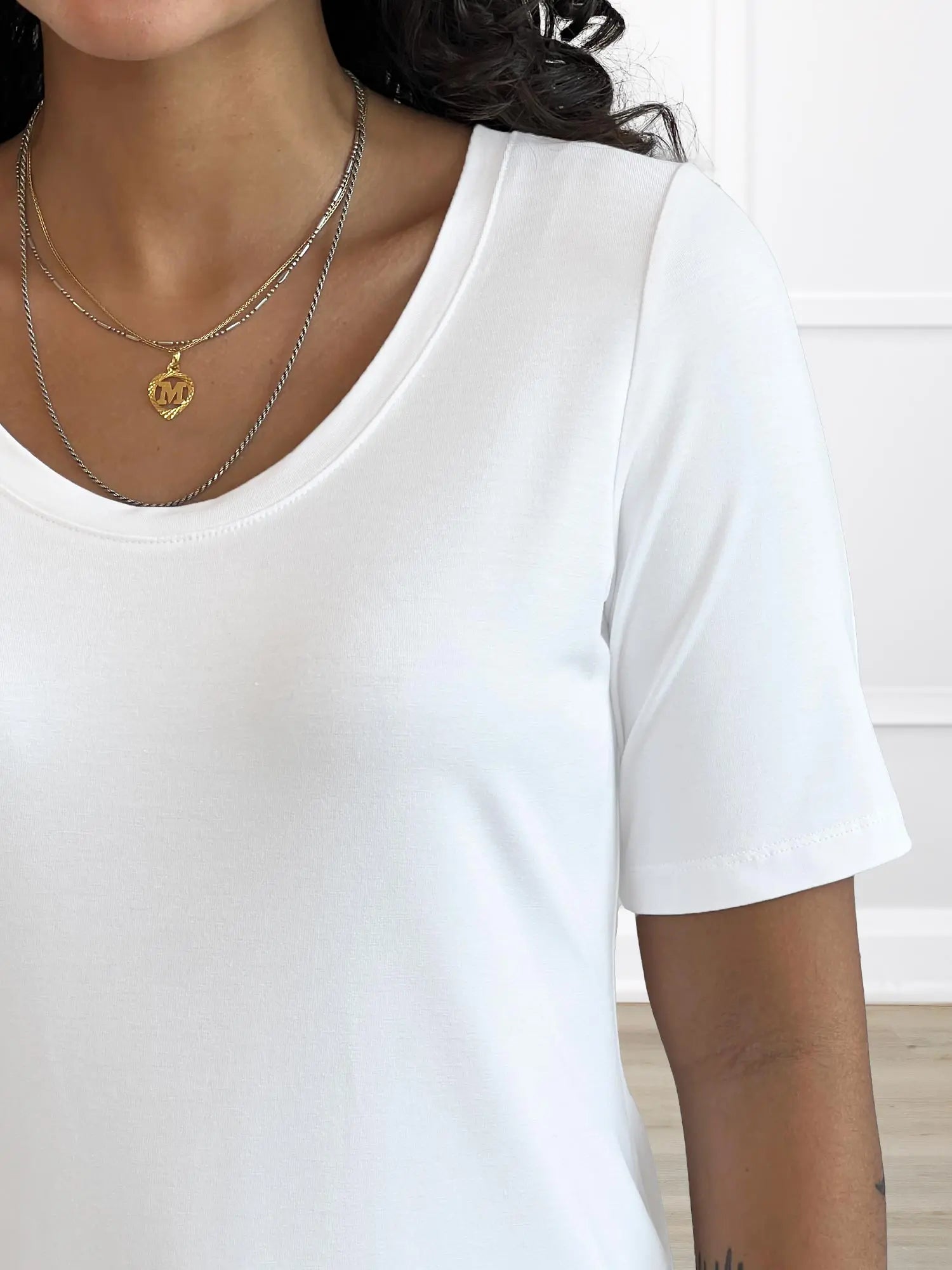 A closeup detail shot of the neckline of Miik&