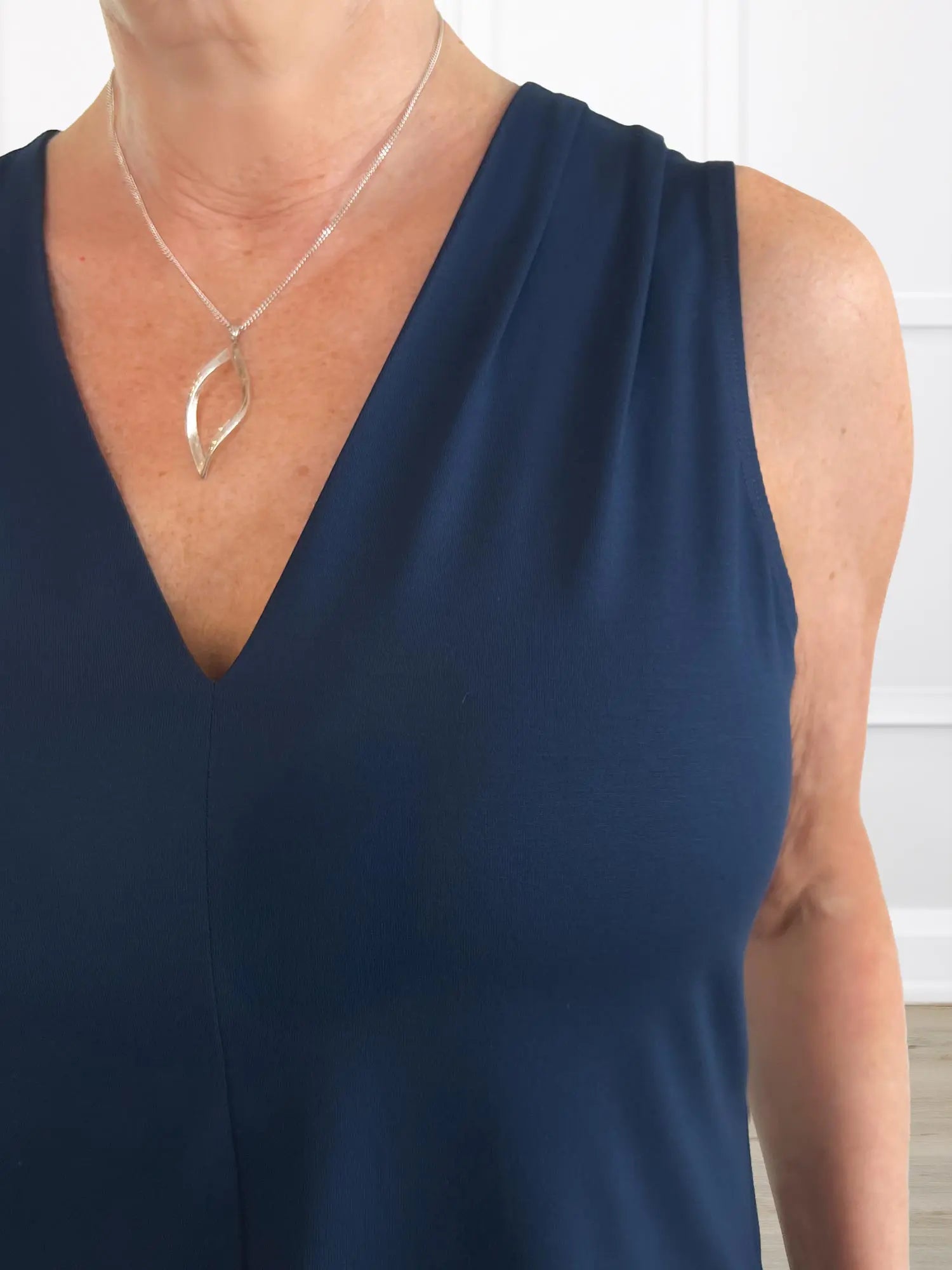 A closeup detail shot of the neckline of Miik&