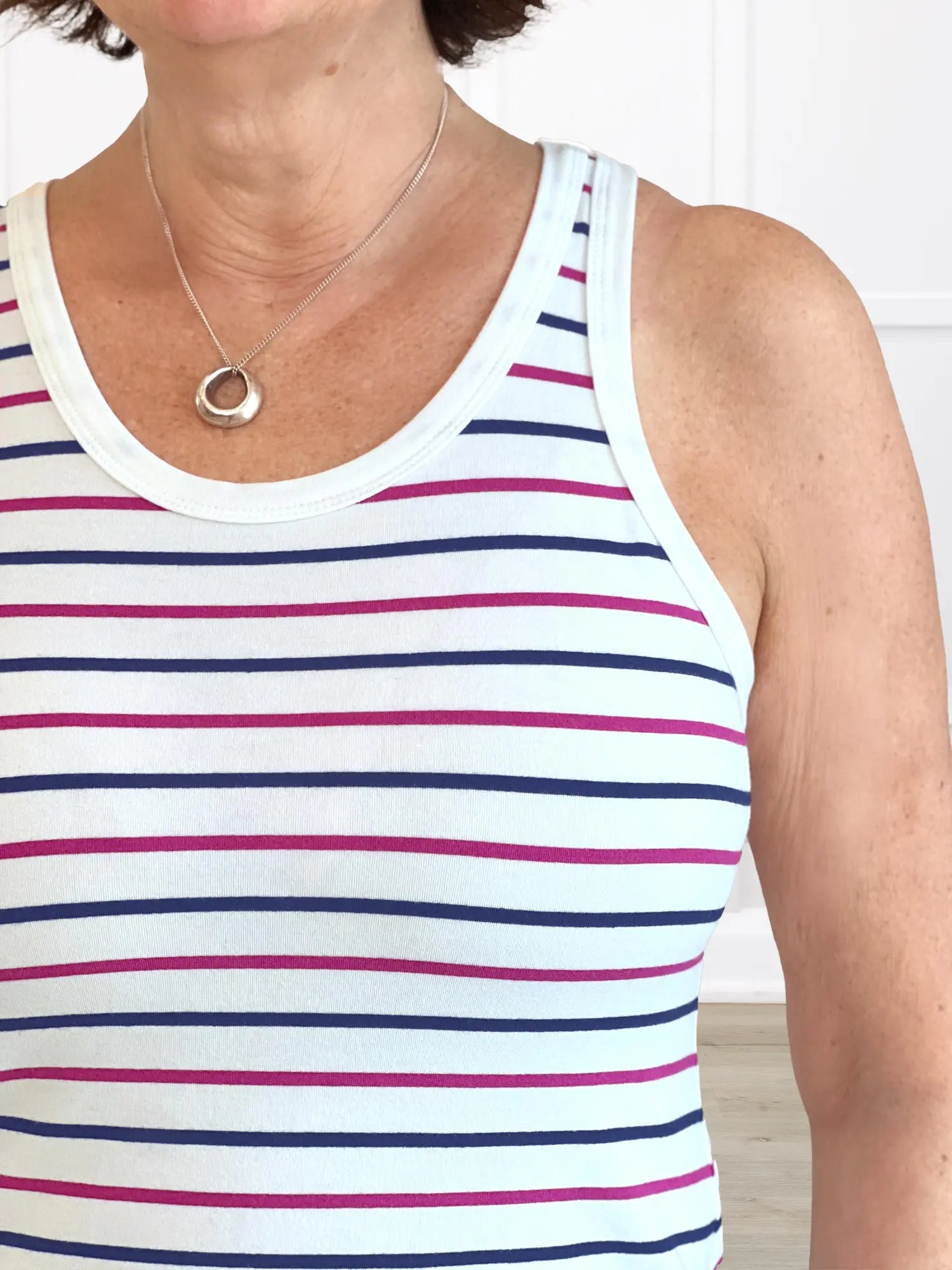 A closeup detail shot of the neckline of Miik&
