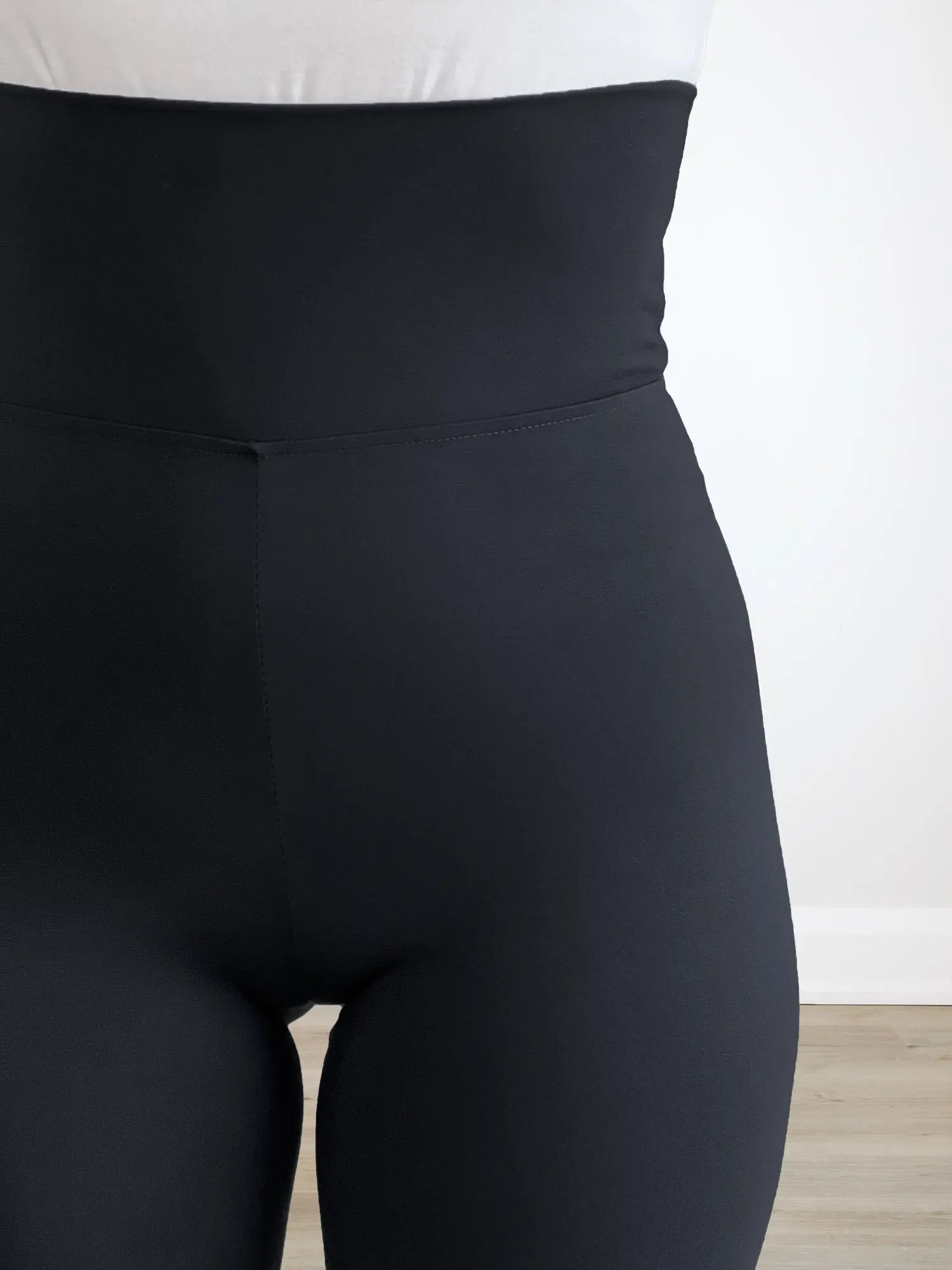 A close up detail image of the waistband of Miik&