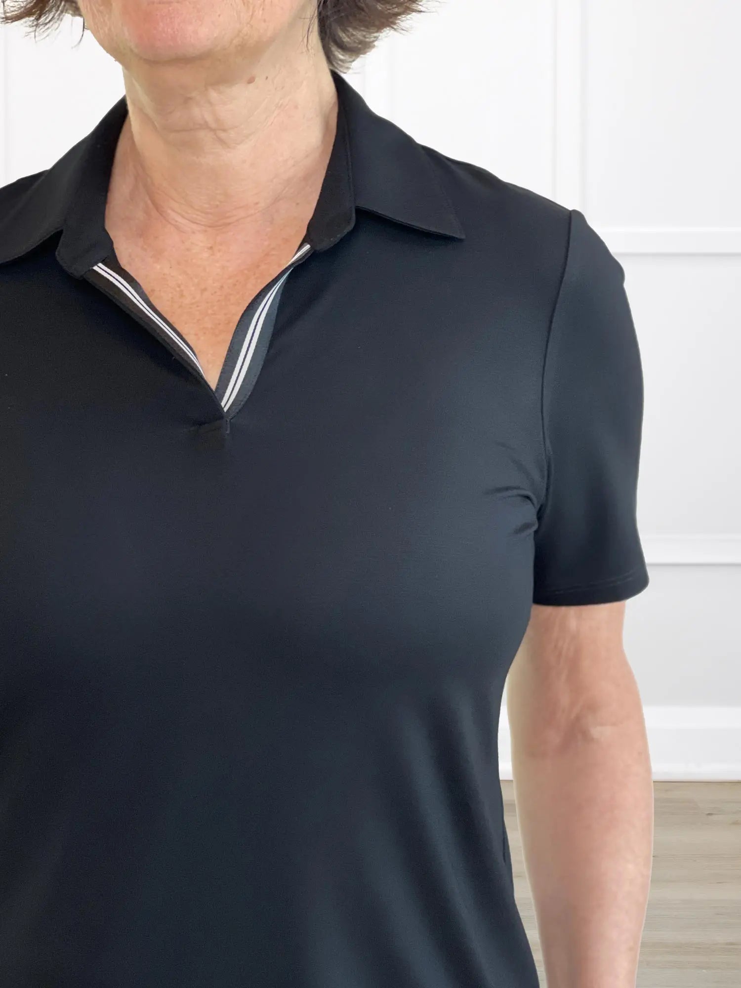 A closeup detail shot of the neckline of Miik&