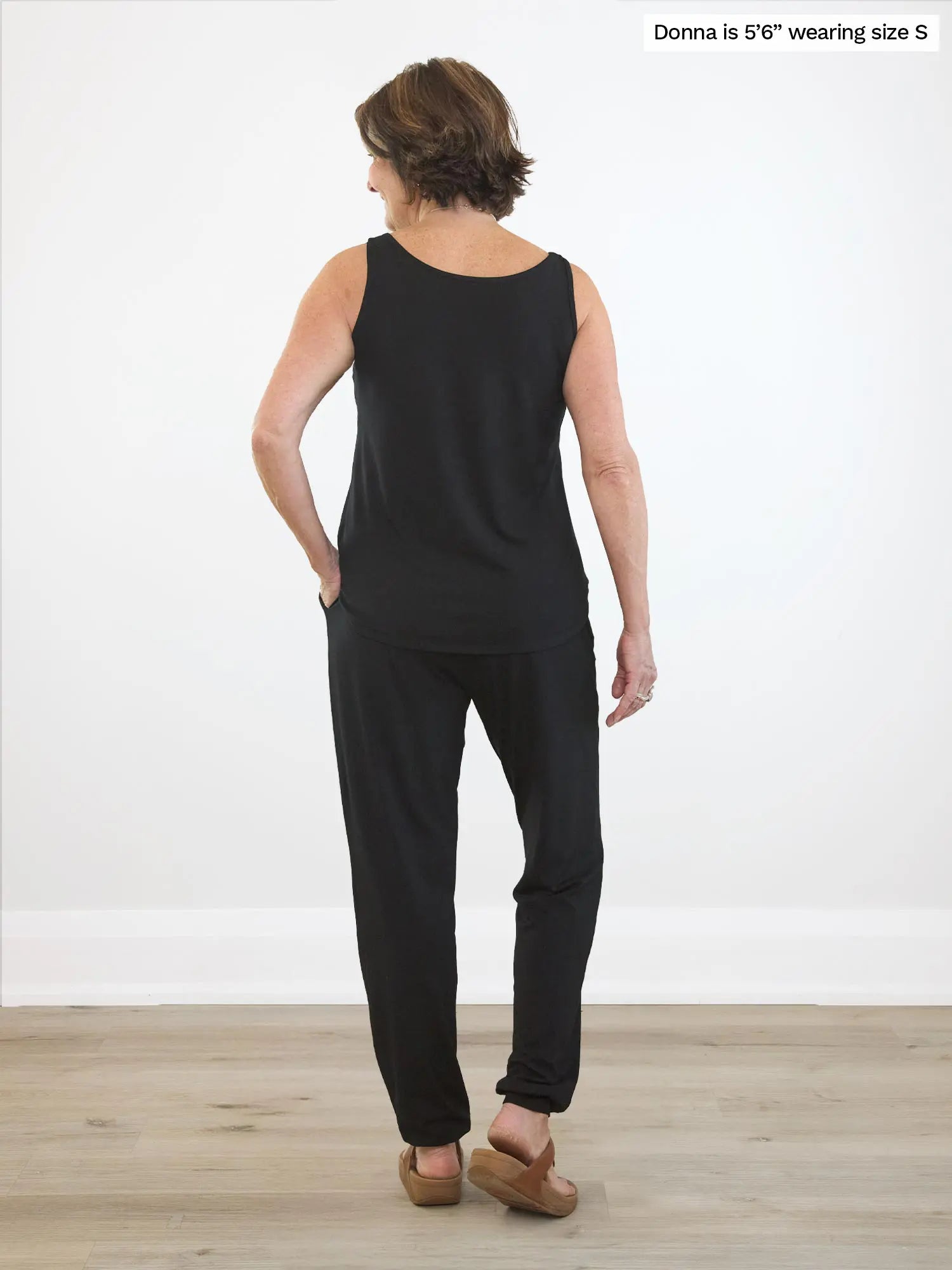 Miik founder Donna (5’6”, small) standing with her back towards the camera showing the back of Miik&