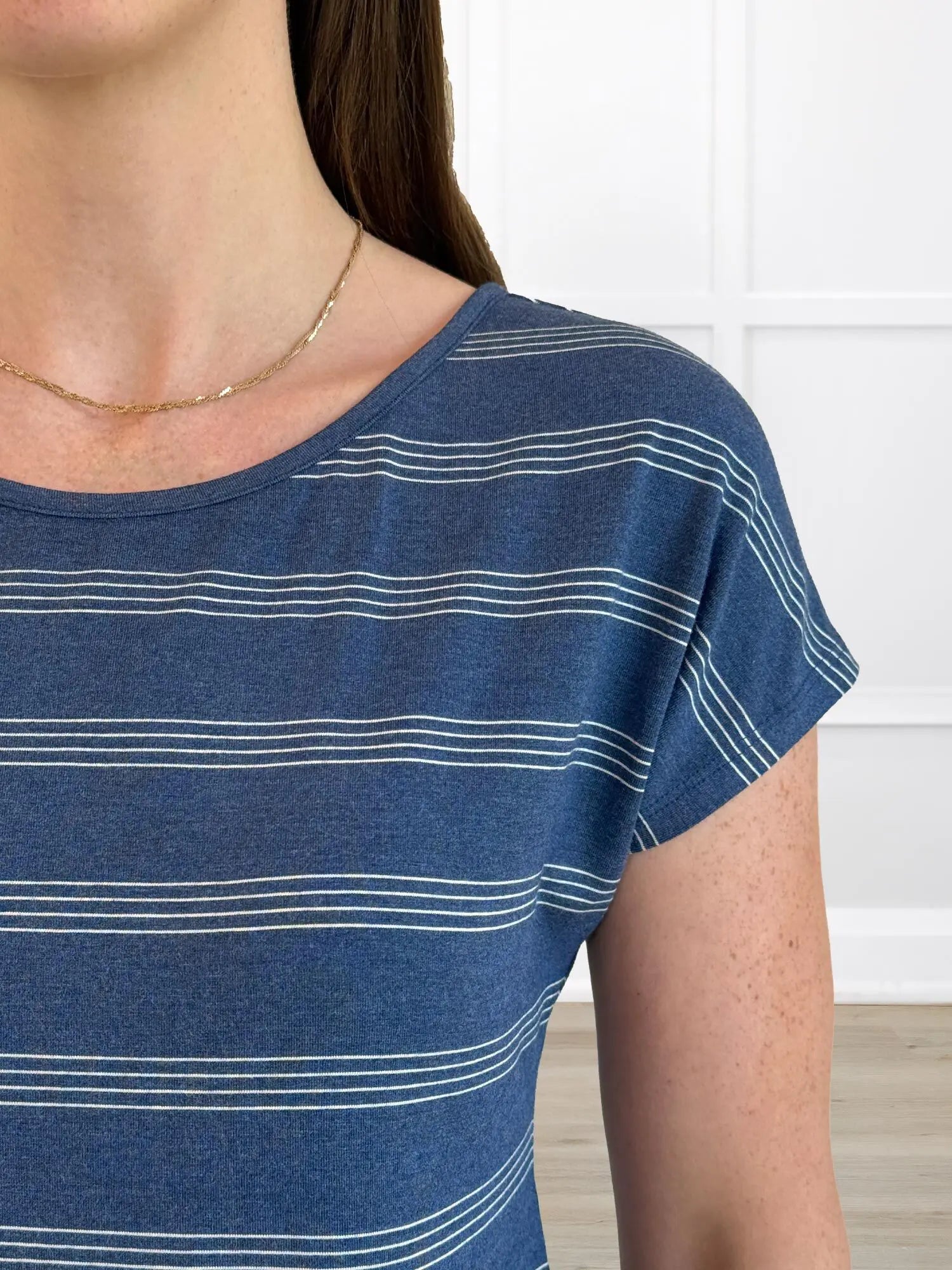 A closeup detail shot of the neckline of Miik&