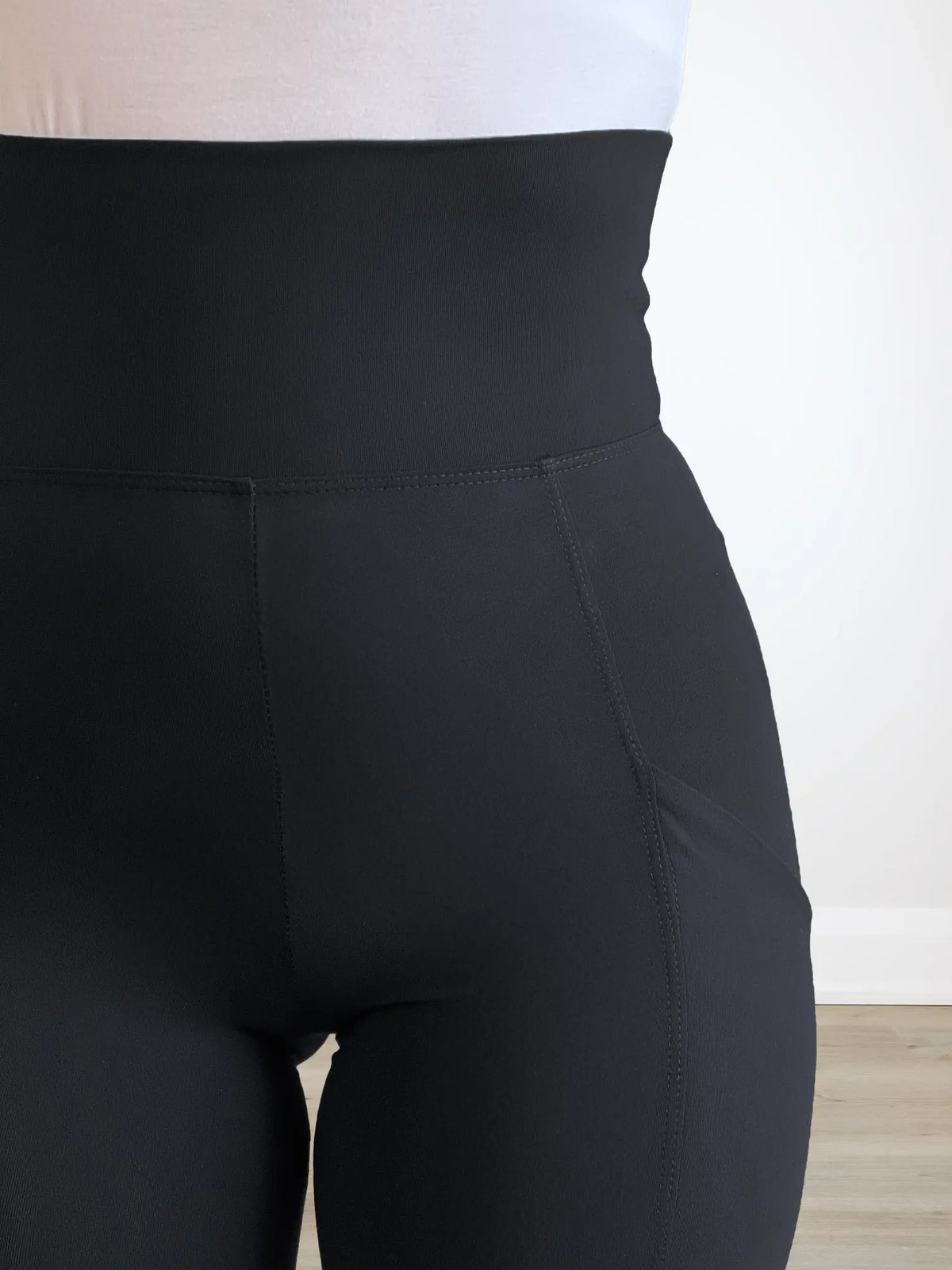 A close up image of the waistband and pocket of Miik&