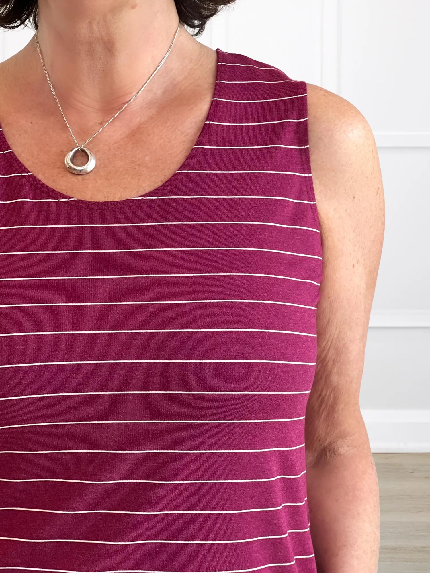 A closeup detail of the neckline of Miik&