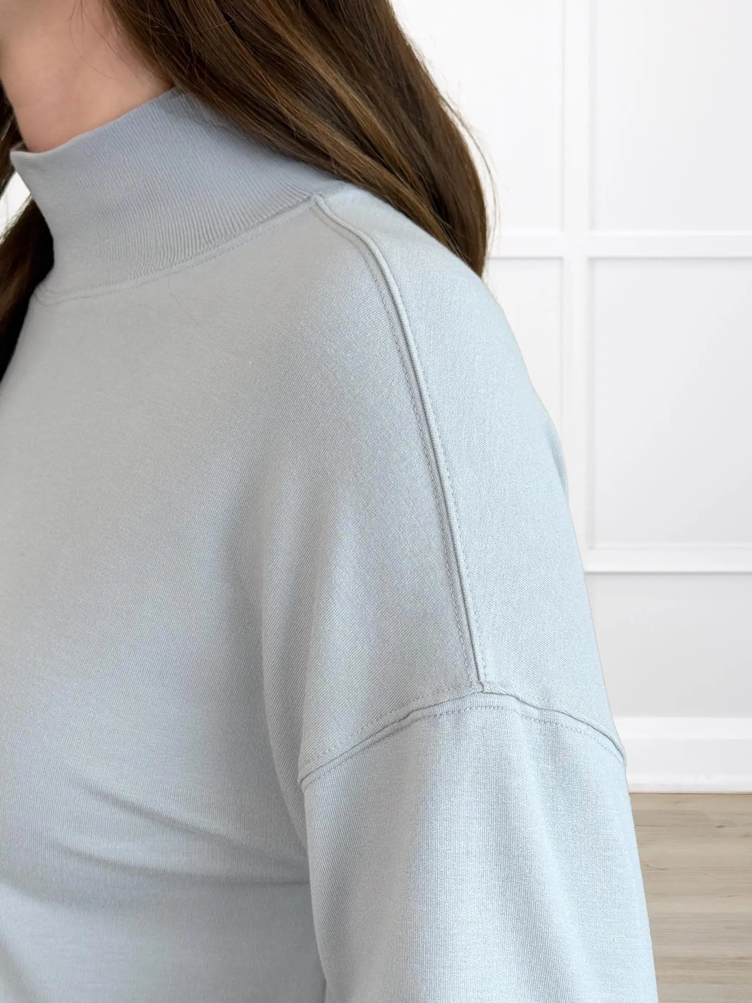 A closeup detail of the shoulder of Miik&