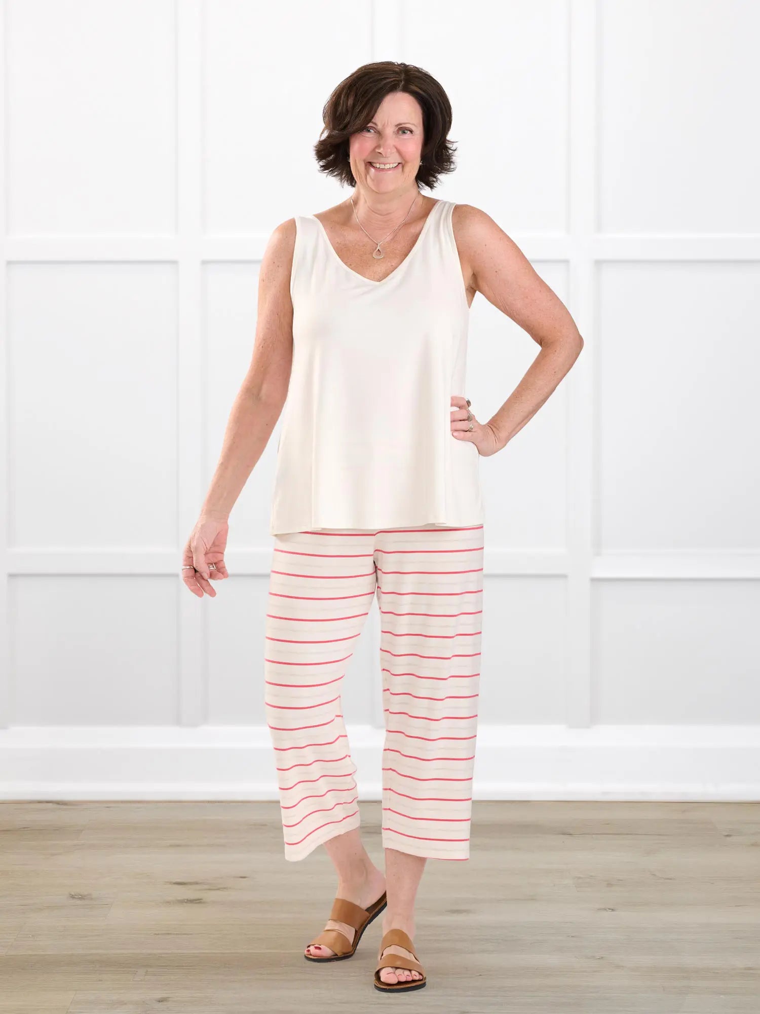 Adhara striped pj capri pant for women in Flamingo stripe on model Donna, size S @Donna-S