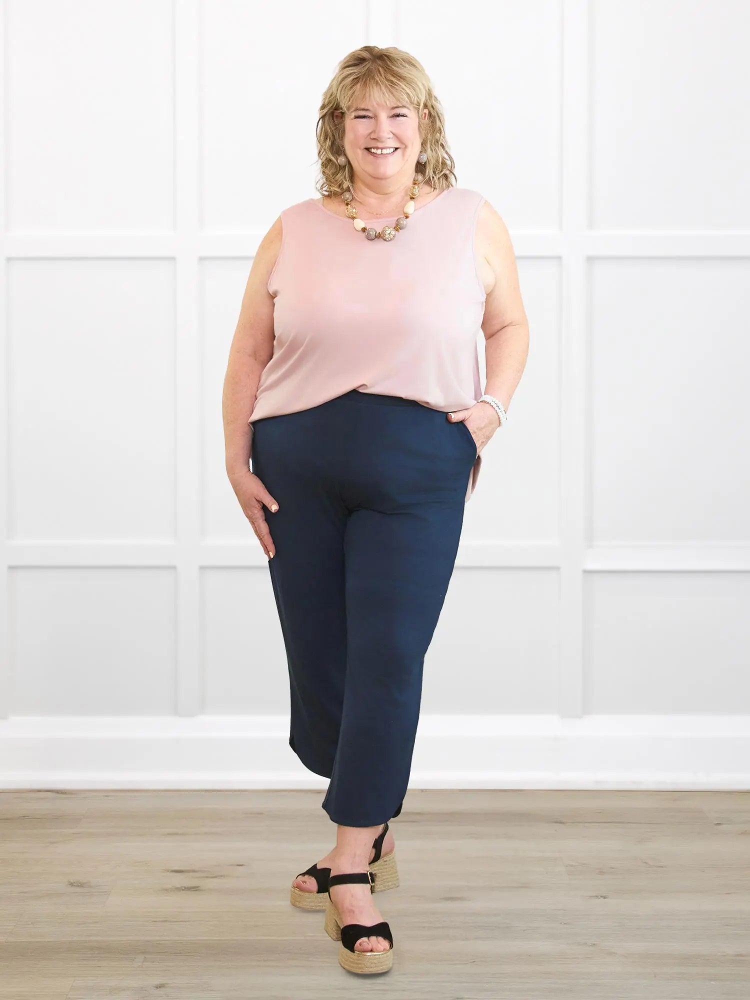 Akira tulip hem capri pant for women in Navy on model Kelly, size 2X @Kelly-2X