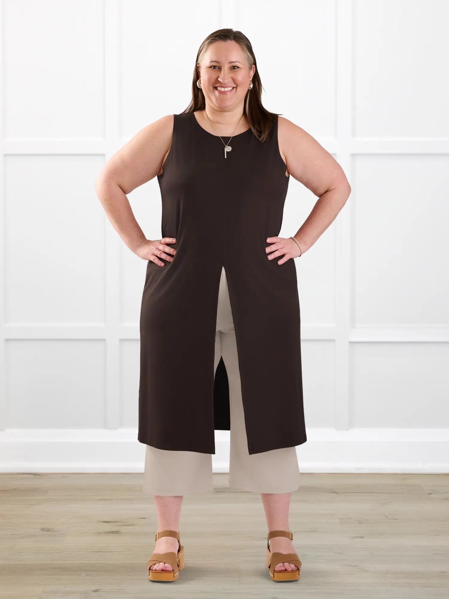 Alaya front slit sleeveless long tunic for women in Dark chocolate on model Cristina, size XXL @Cristina-XXL