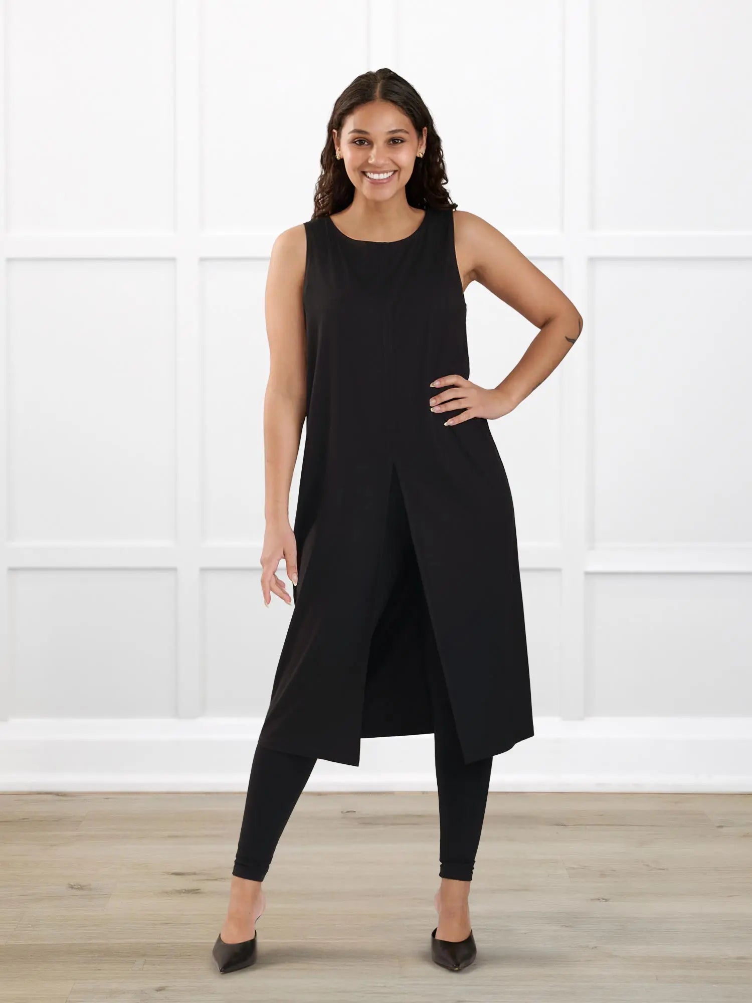 Alaya front slit sleeveless long tunic for women in Black on model Meron, size XS @Meron-XS