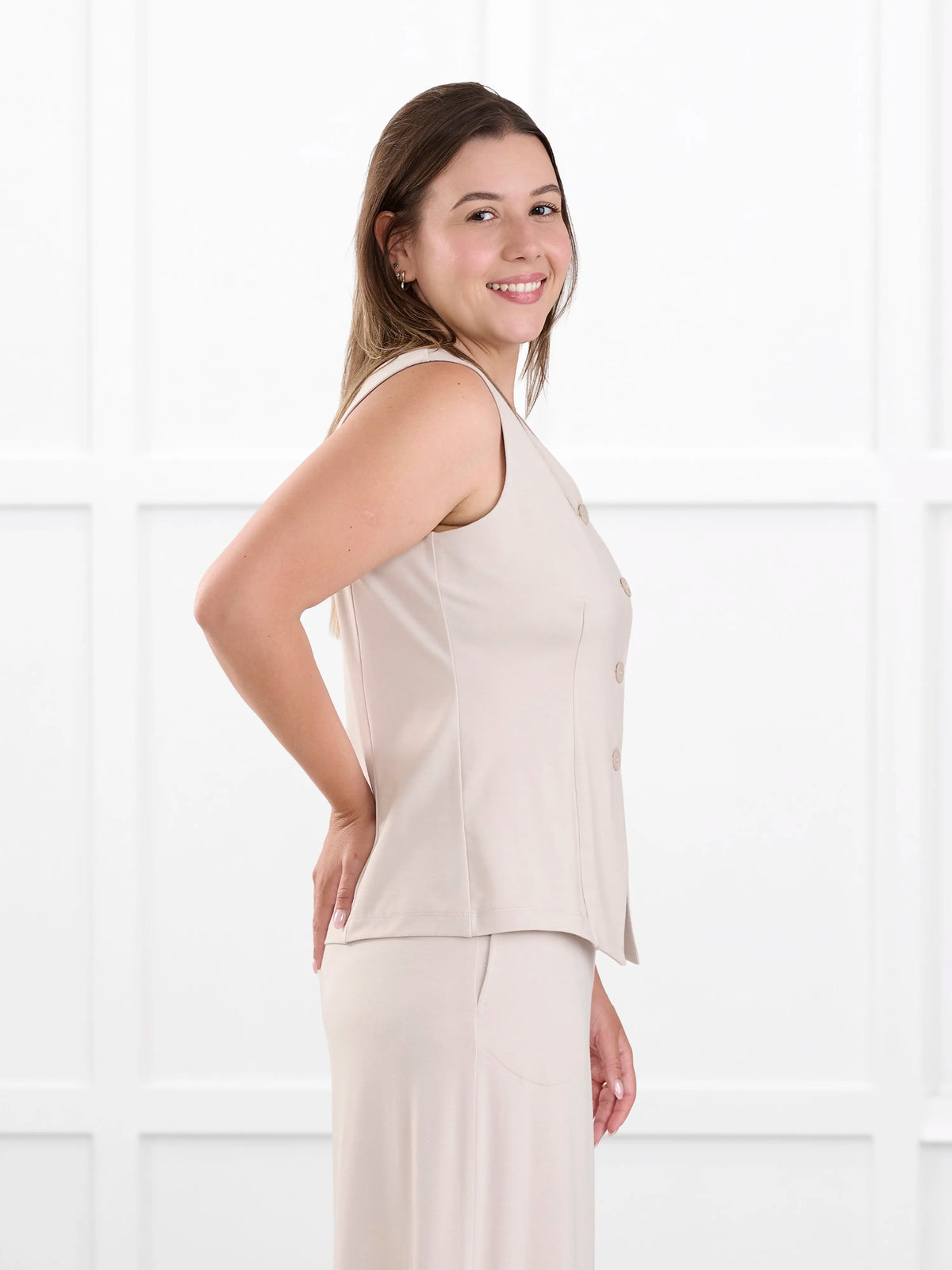 Alba tailored stretchy vest for women in Sandstone on model Christal, size S @Christal-S