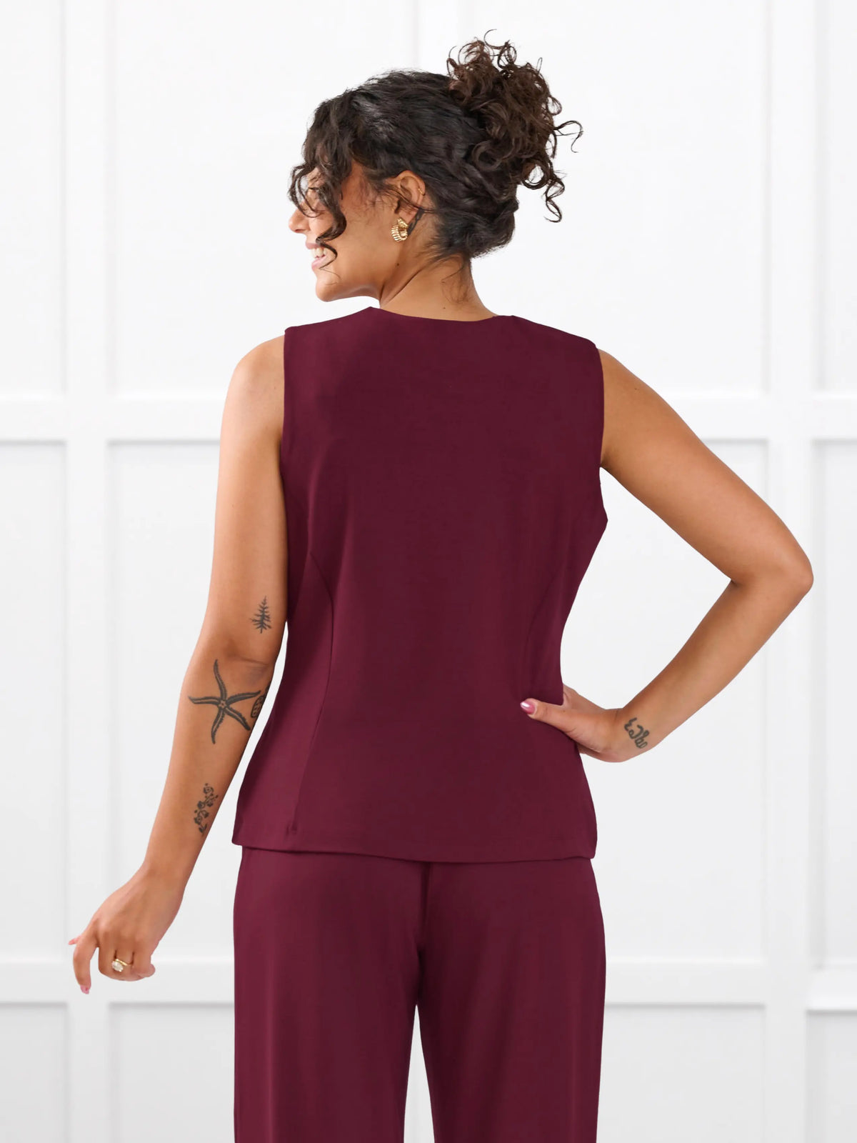 Alba tailored stretchy vest for women in Merlot on model Meron, size XS @Meron-XS