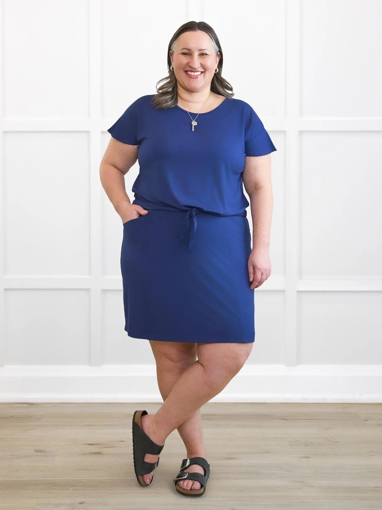 Allegra flutter sleeve knot top for women in Marine blue on model Cristina, size XXL @Cristina-XXL