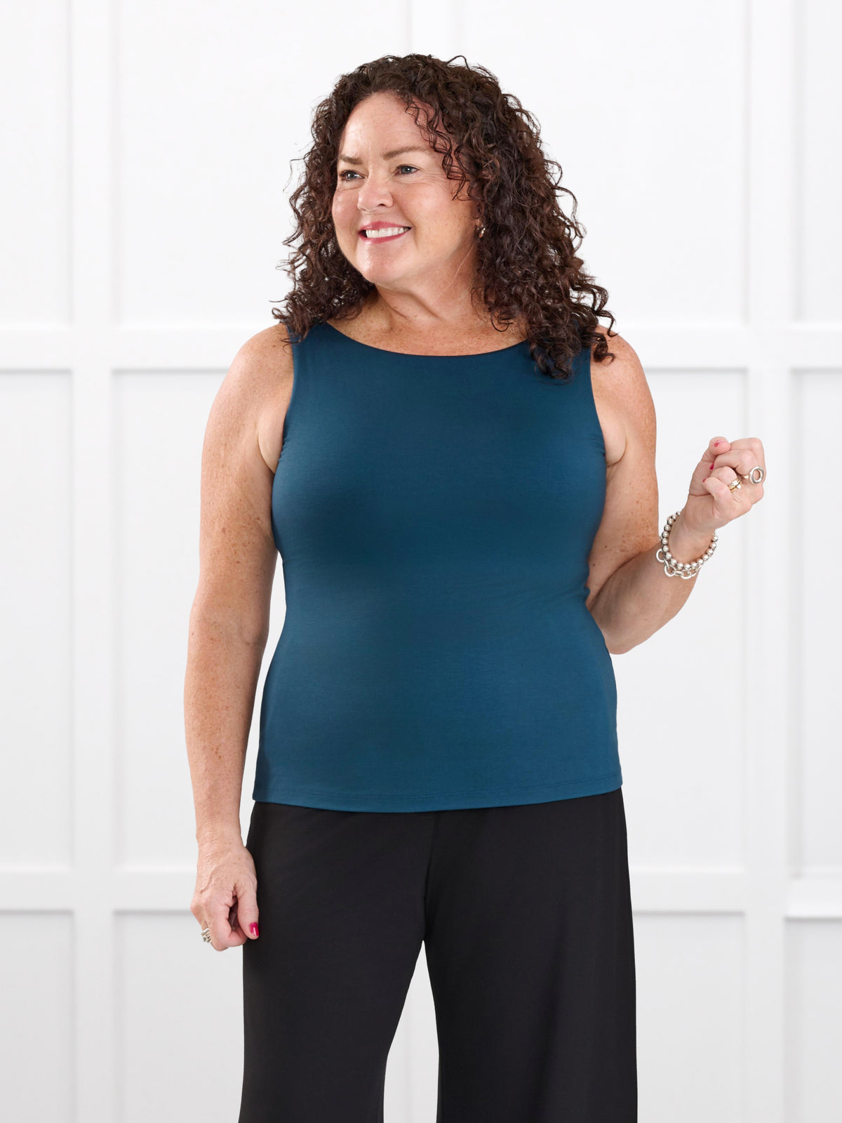 Amina reversible neckline shelf bra tank for women in Atlantic on model Kerri, size M @Kerri-M