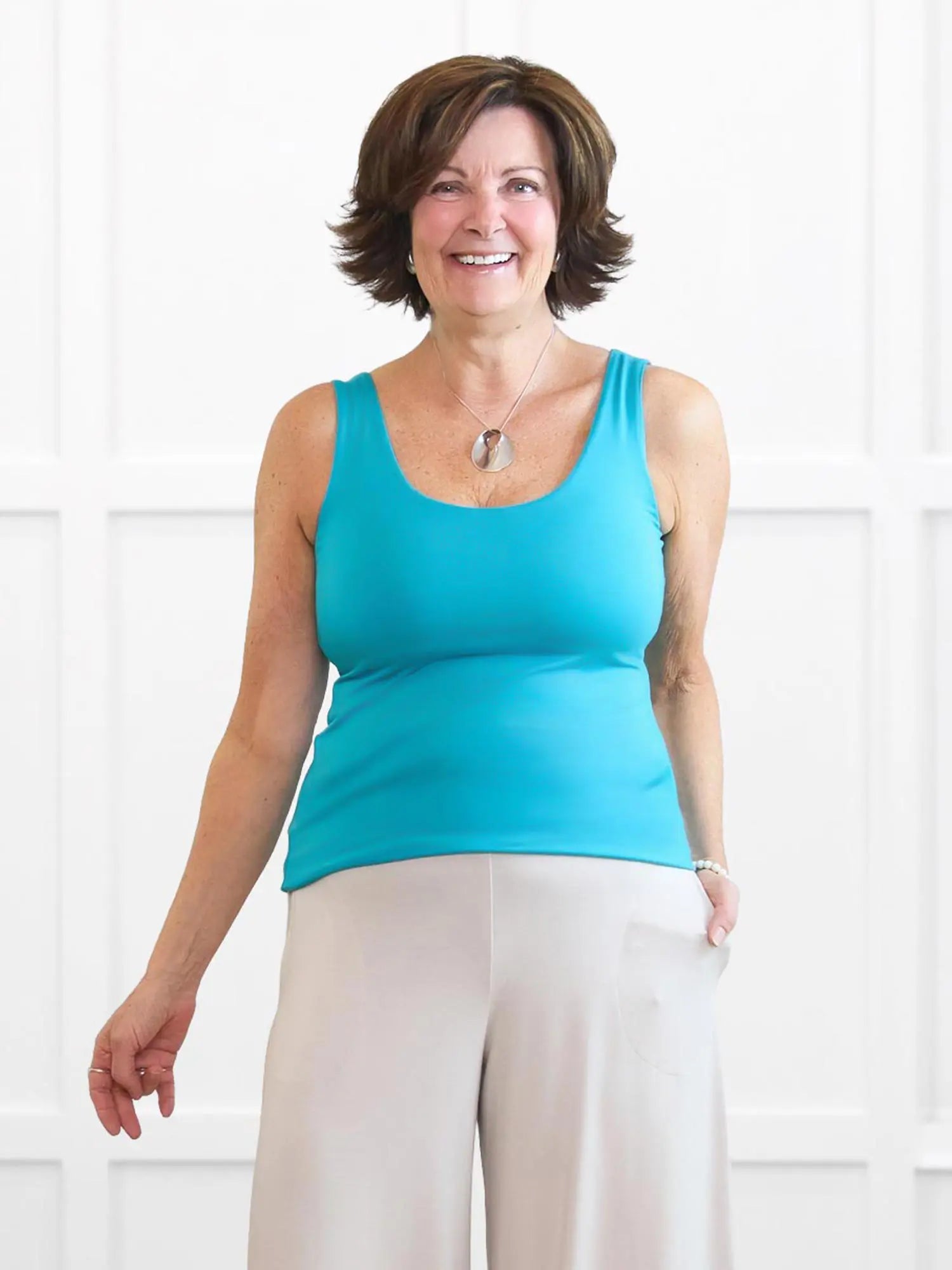 Amina reversible neckline shelf bra tank for women 00 in Sea glass on model Donna, size S @Donna-S