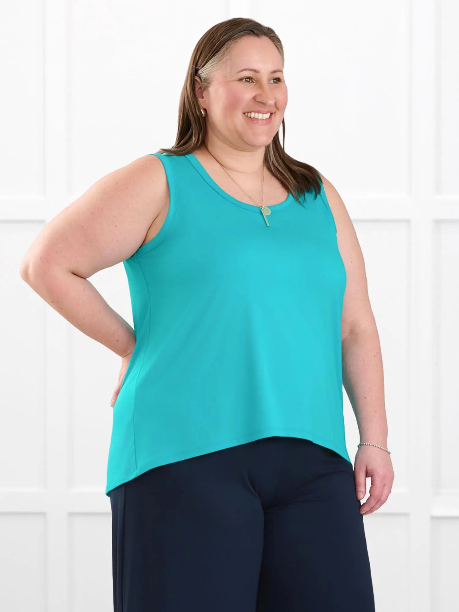 Anjuli flowy scoop neck tank for women in Sea glass on model Cristina, size XXL @Cristina-XXL