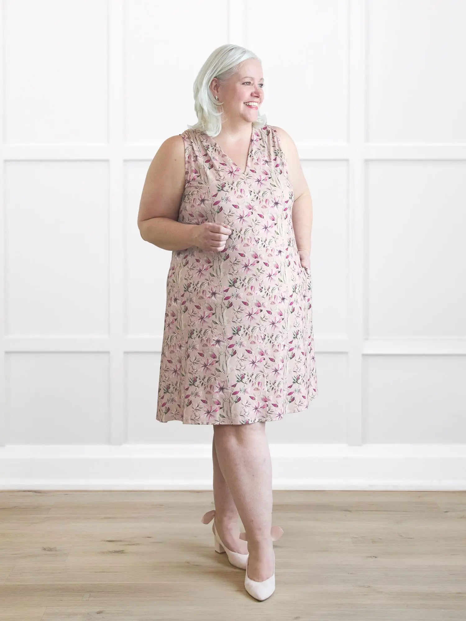 Bevlyn sleeveless v neck pocket dress in Wild magnolia on model Colleen, size XXL @Colleen-XXL