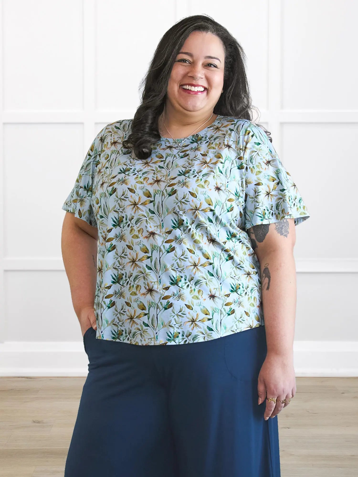 Brielle flutter sleeve top 00 in Forest veil on model Sarita, size 2X @Sarita-2x