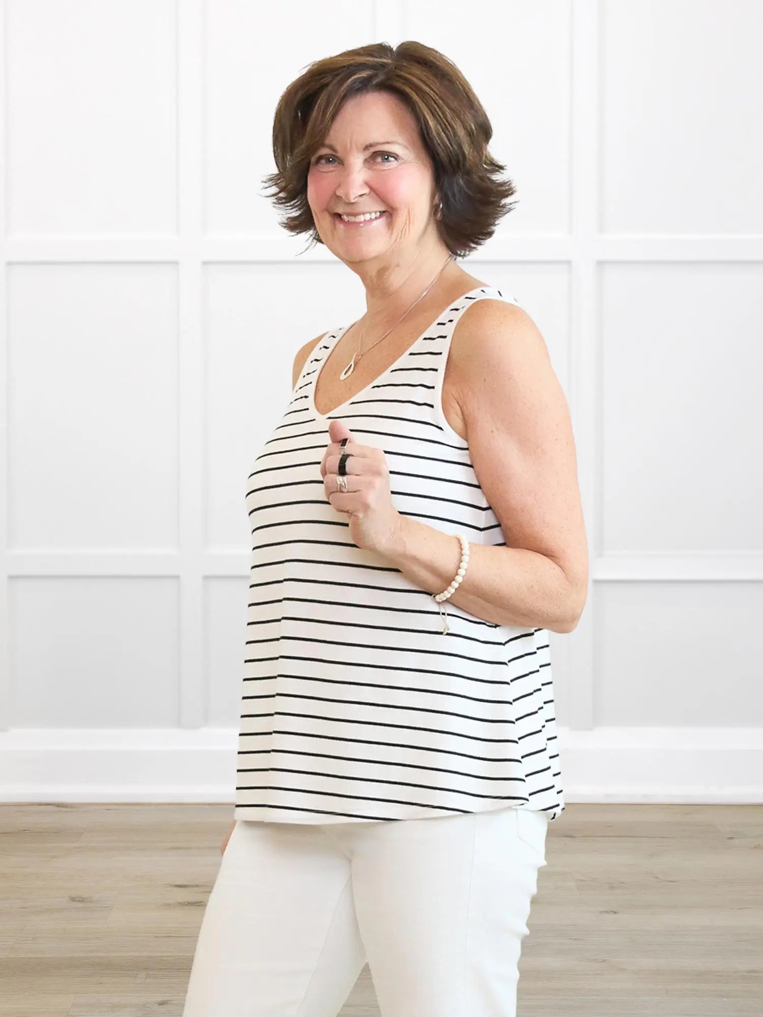Codi reversible neckline flowy tank for women in Newport stripe on model Donna, size S @Donna-S-regular