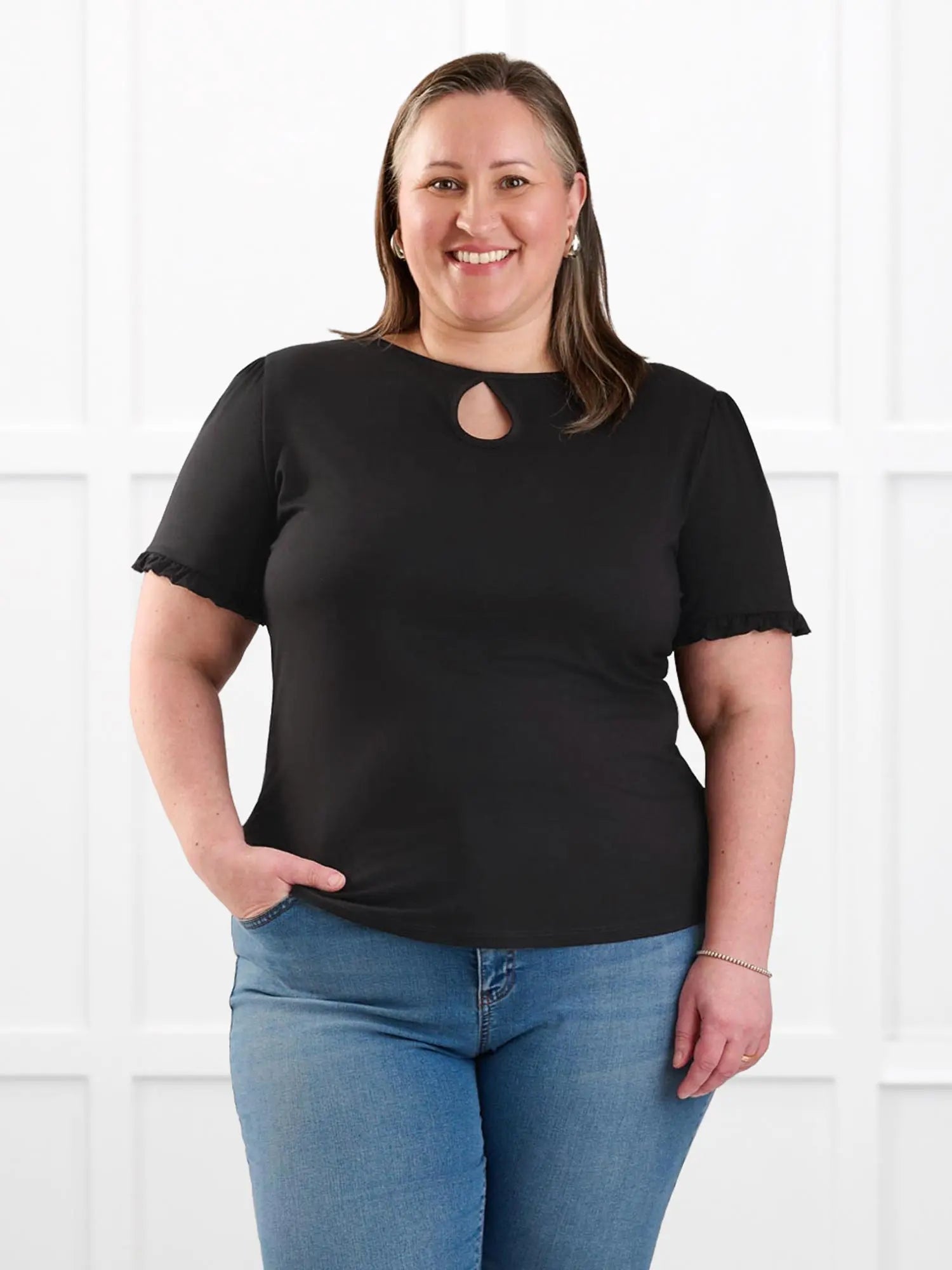Darlene reversible neckline ruffle sleeve top for women in Black on model Cristina, size XXL @Cristina-XXL