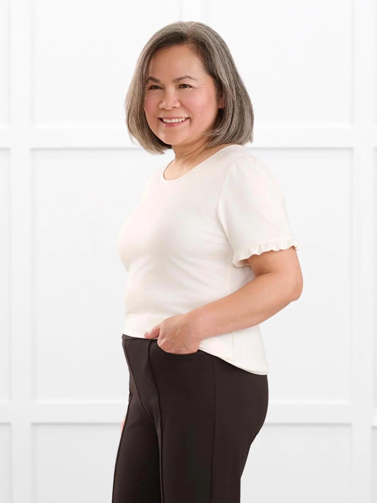 Darlene reversible neckline ruffle sleeve top for women in Natural on model Terry, size S @Terry-S