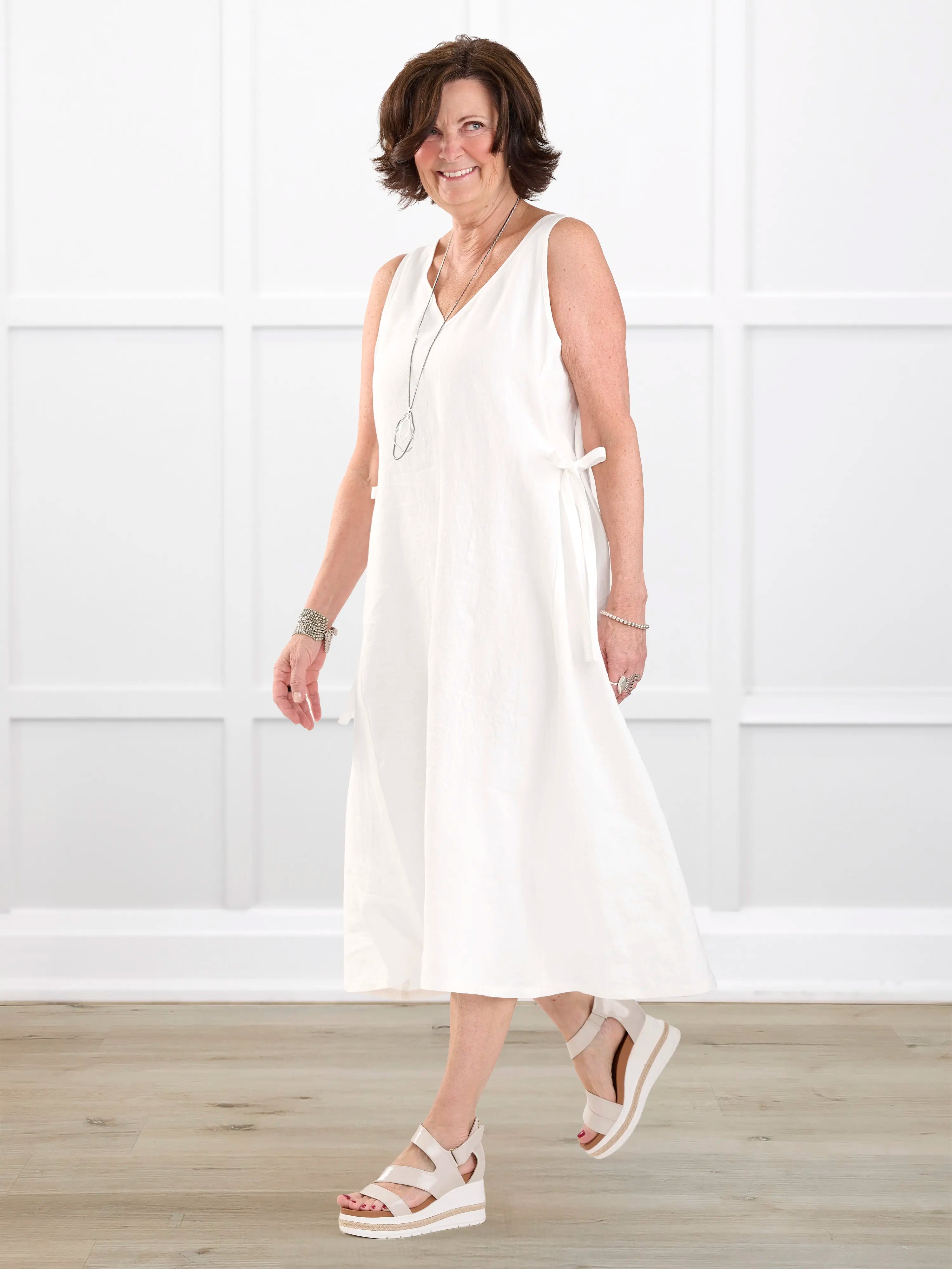 Delfina reversible neckline linen dress for women in Ivory linen on model Donna, size S @Donna-S