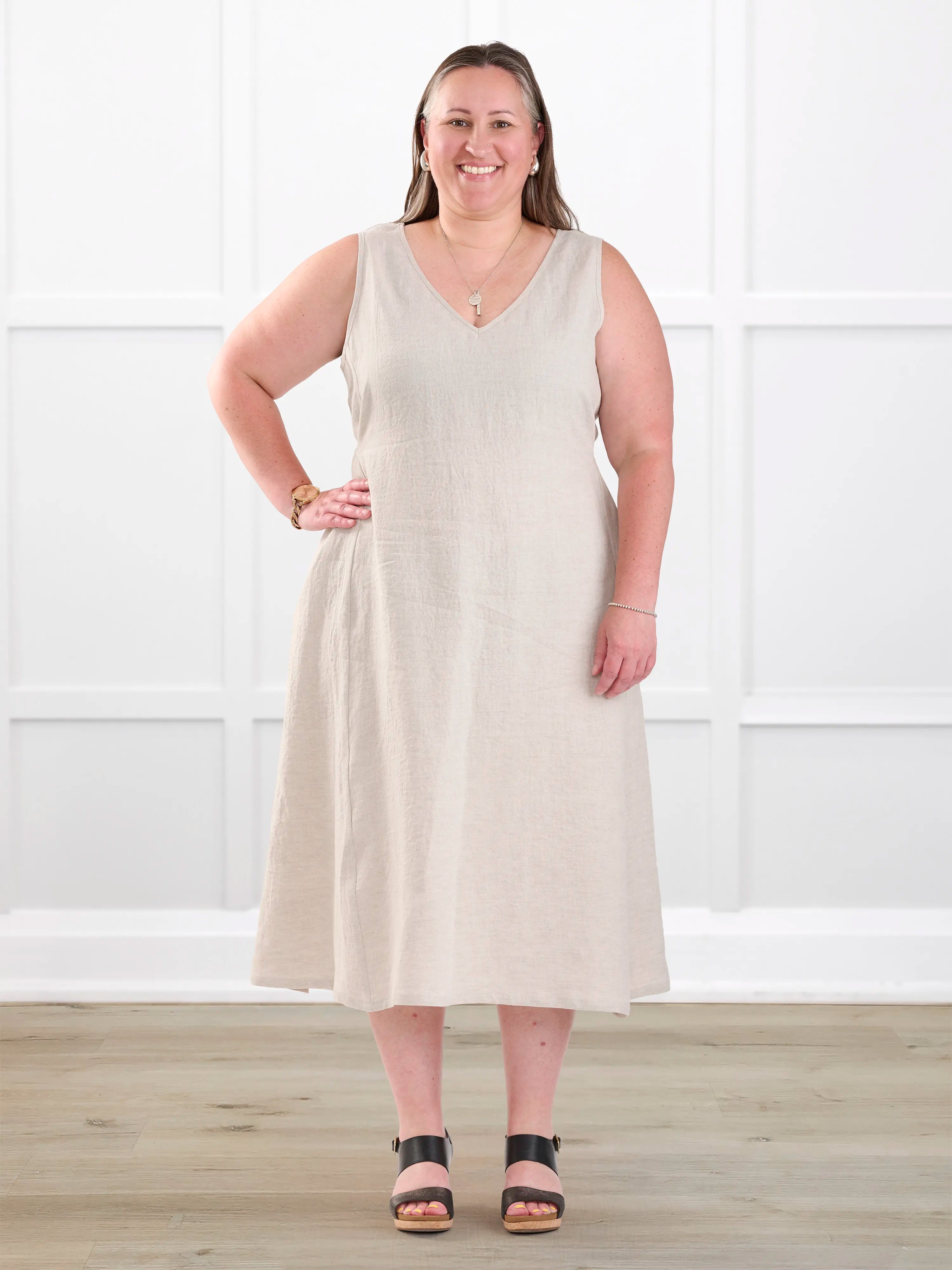 Delfina reversible neckline linen dress for women in Sand linen on model Cristina, size XXL @Cristina-XXL