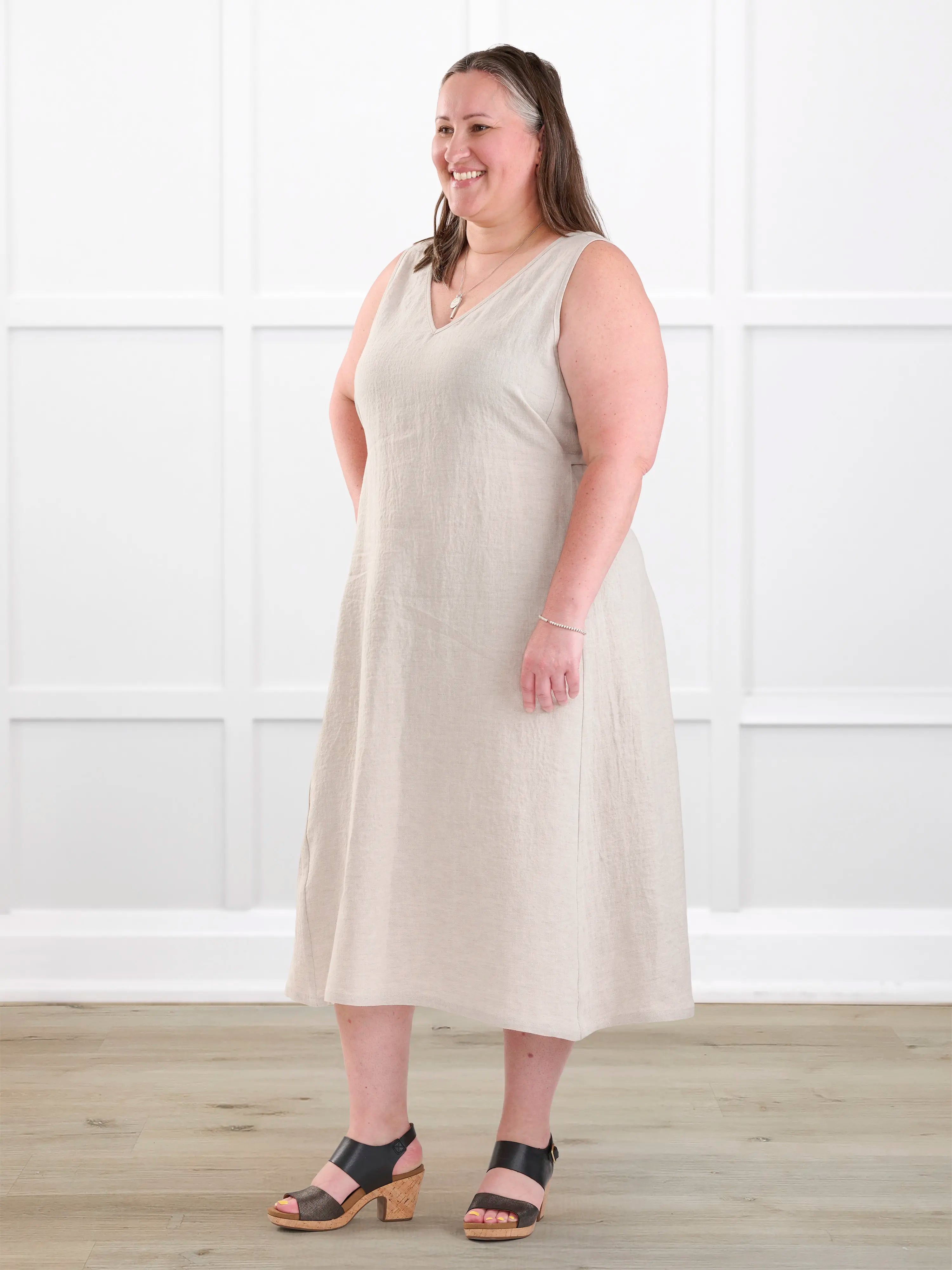 Delfina reversible neckline linen dress for women in Sand linen on model Cristina, size XXL @Cristina-XXL