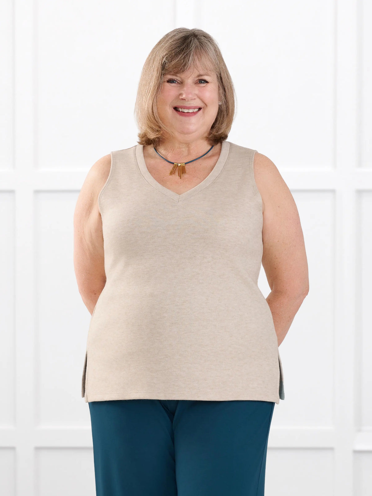 Dory v neck sweater vest for women in Oatmeal melange on model Laurie, size XXL @Laurie-XXL