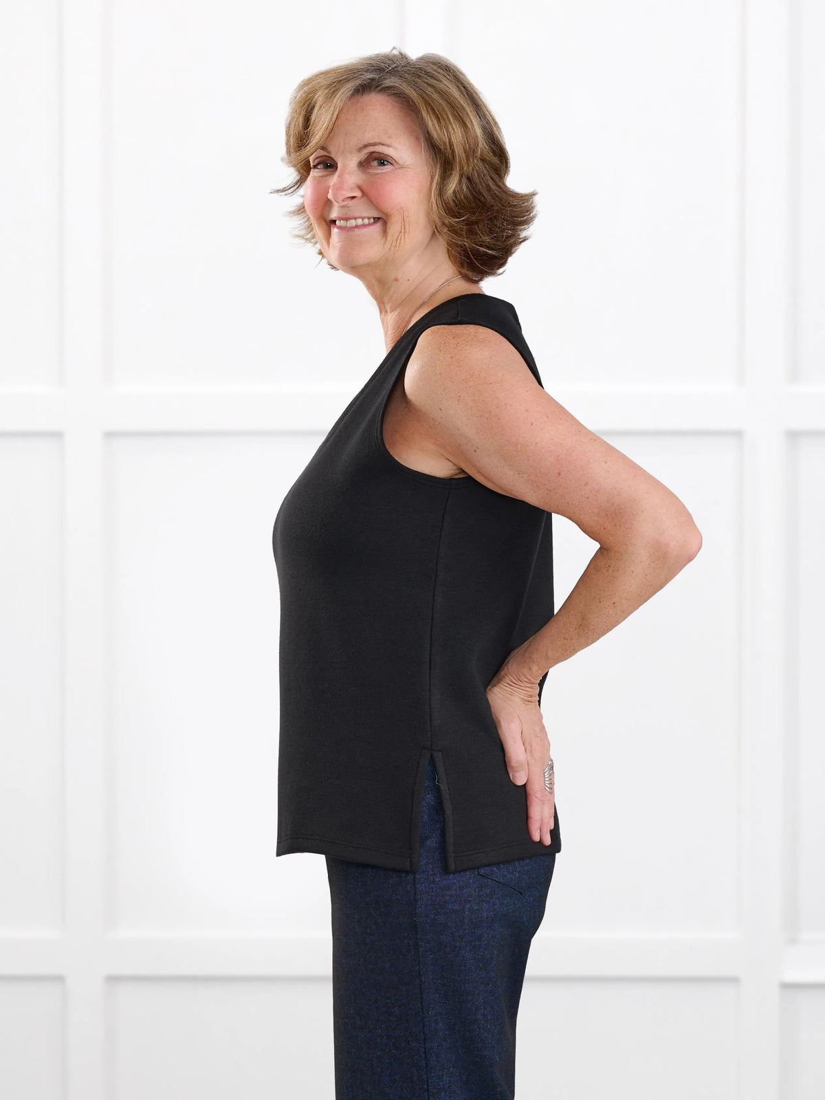 Dory v neck sweater vest for women in Black on model Donna, size S @Donna-S