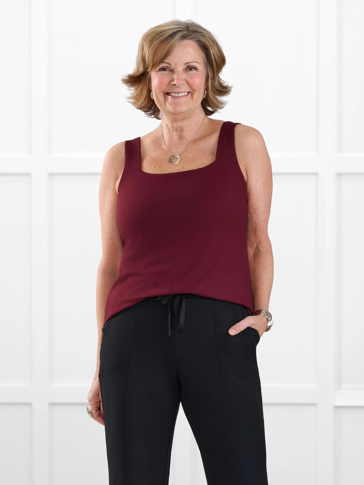 Eline reversible neckline shelf bra tank for women in Merlot on model Donna, size S @Donna-S