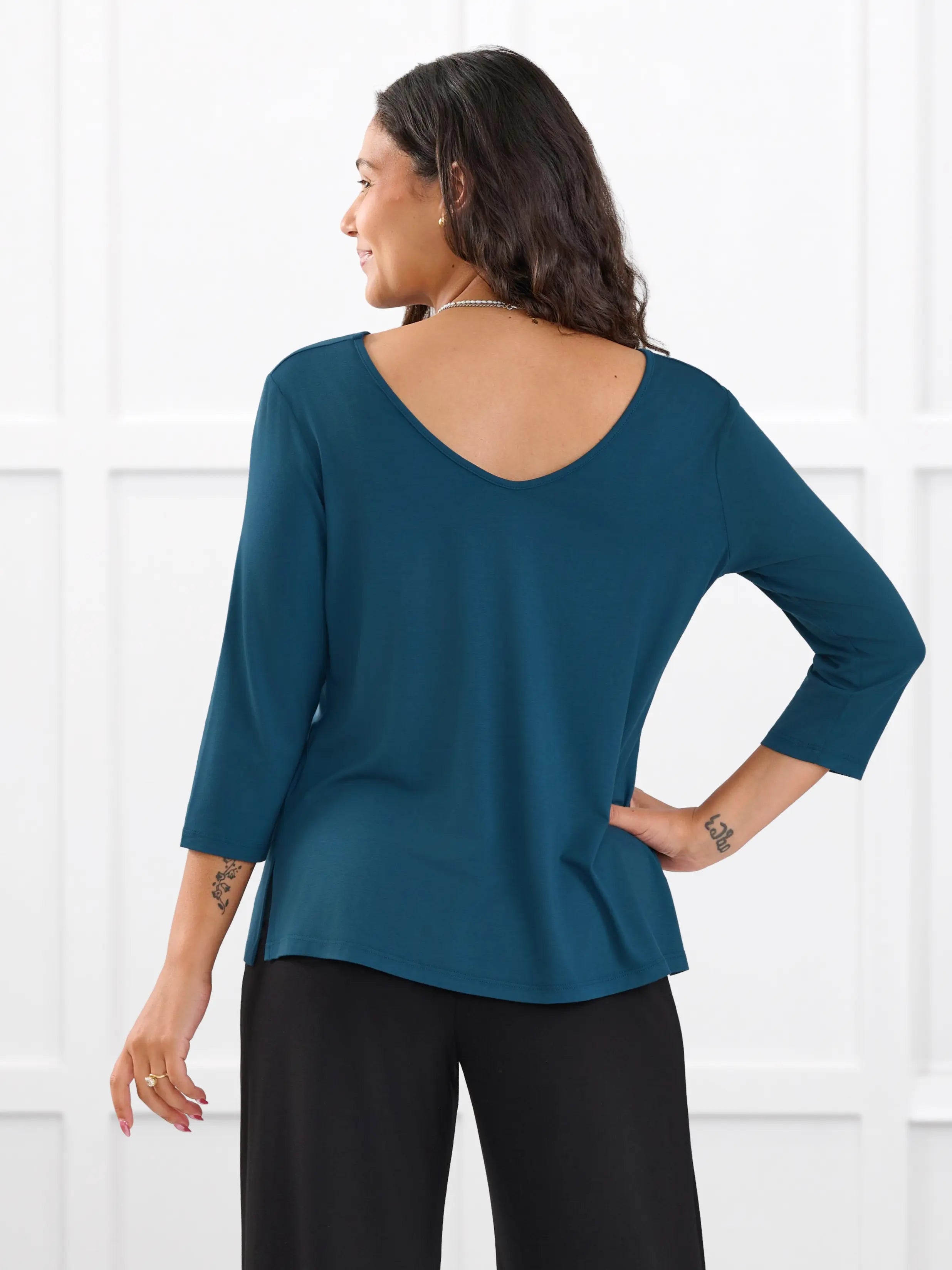 Fran reversible neckline sleeve top for women in Atlantic on model Meron, size XS @Meron-XS