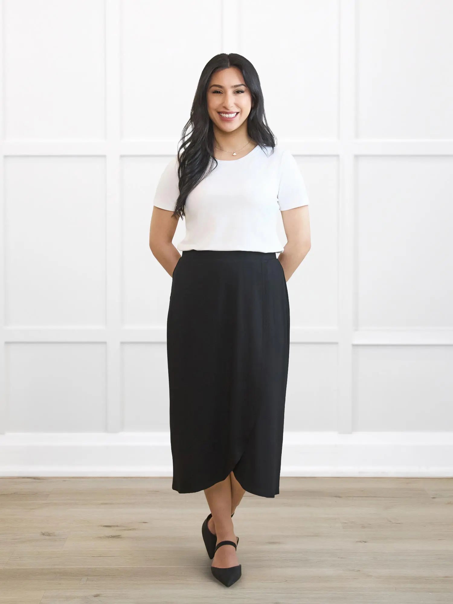 Ginny faux wrap midi skirt for women 00 in Black on model Yasmine, size XS Petite @Yasmine-XS-petite