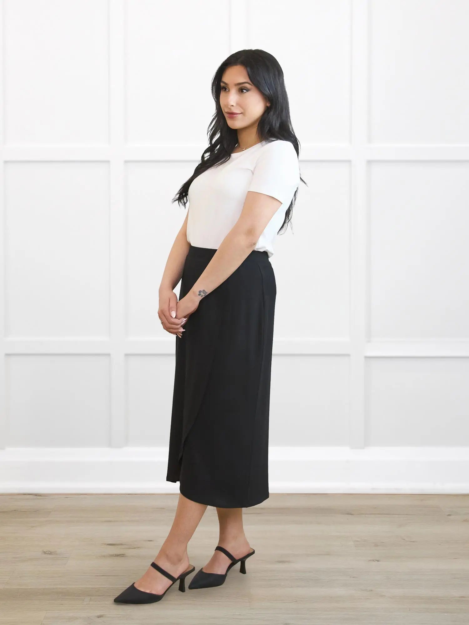 Ginny faux wrap midi skirt for women in Black on model Yasmine, size XS Petite @Yasmine-XS-petite