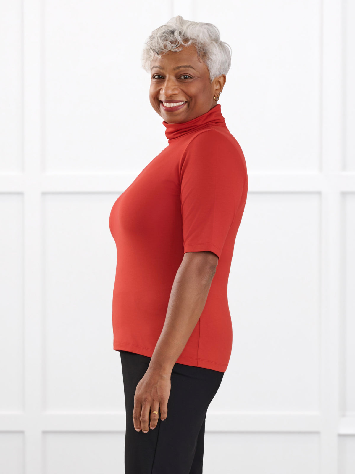 Halima half sleeve turtleneck top for women in Terracotta on model Keethai, size M @Keethai-M