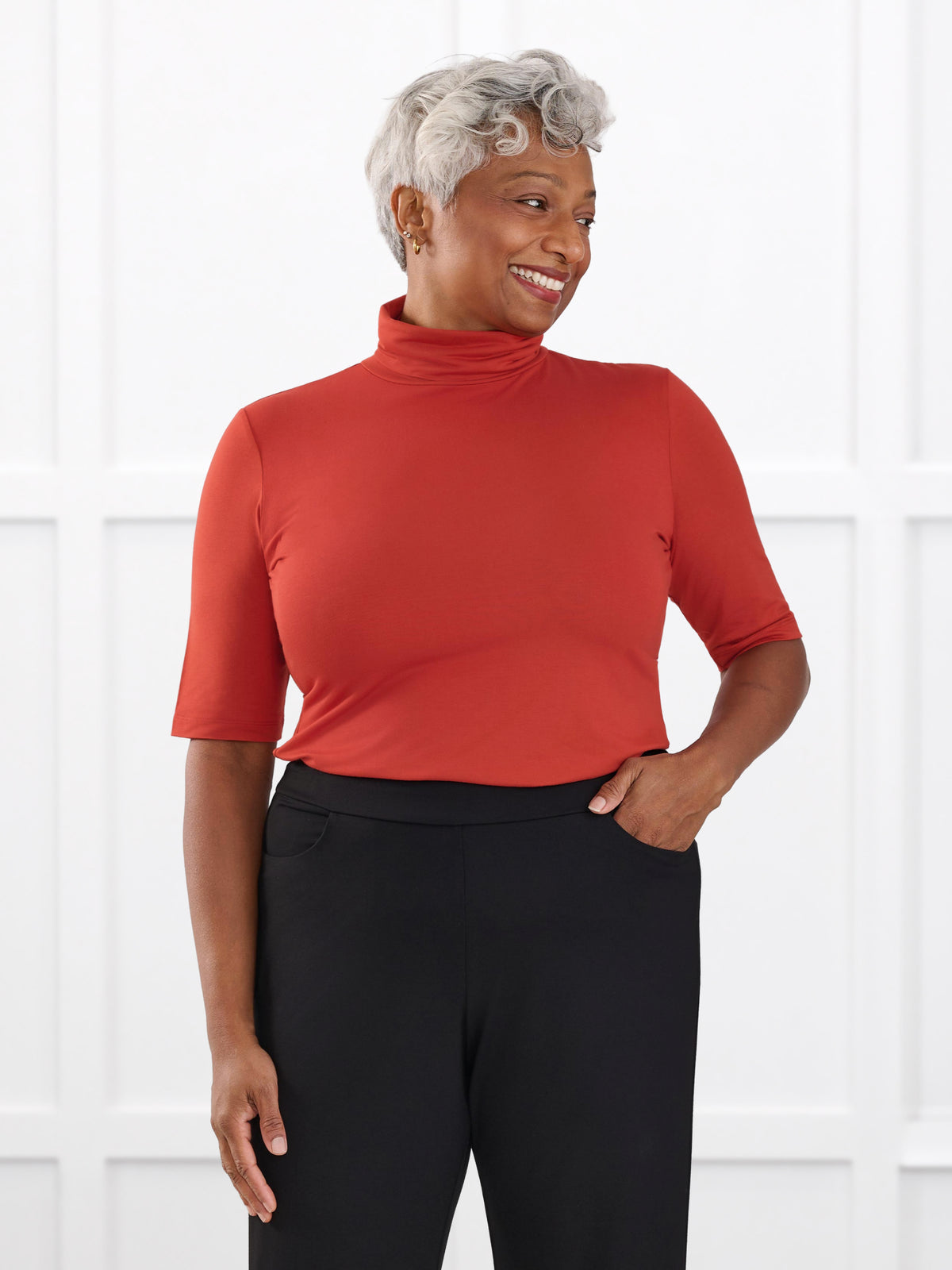 Halima half sleeve turtleneck top for women in Terracotta on model Keethai, size M @Keethai-M