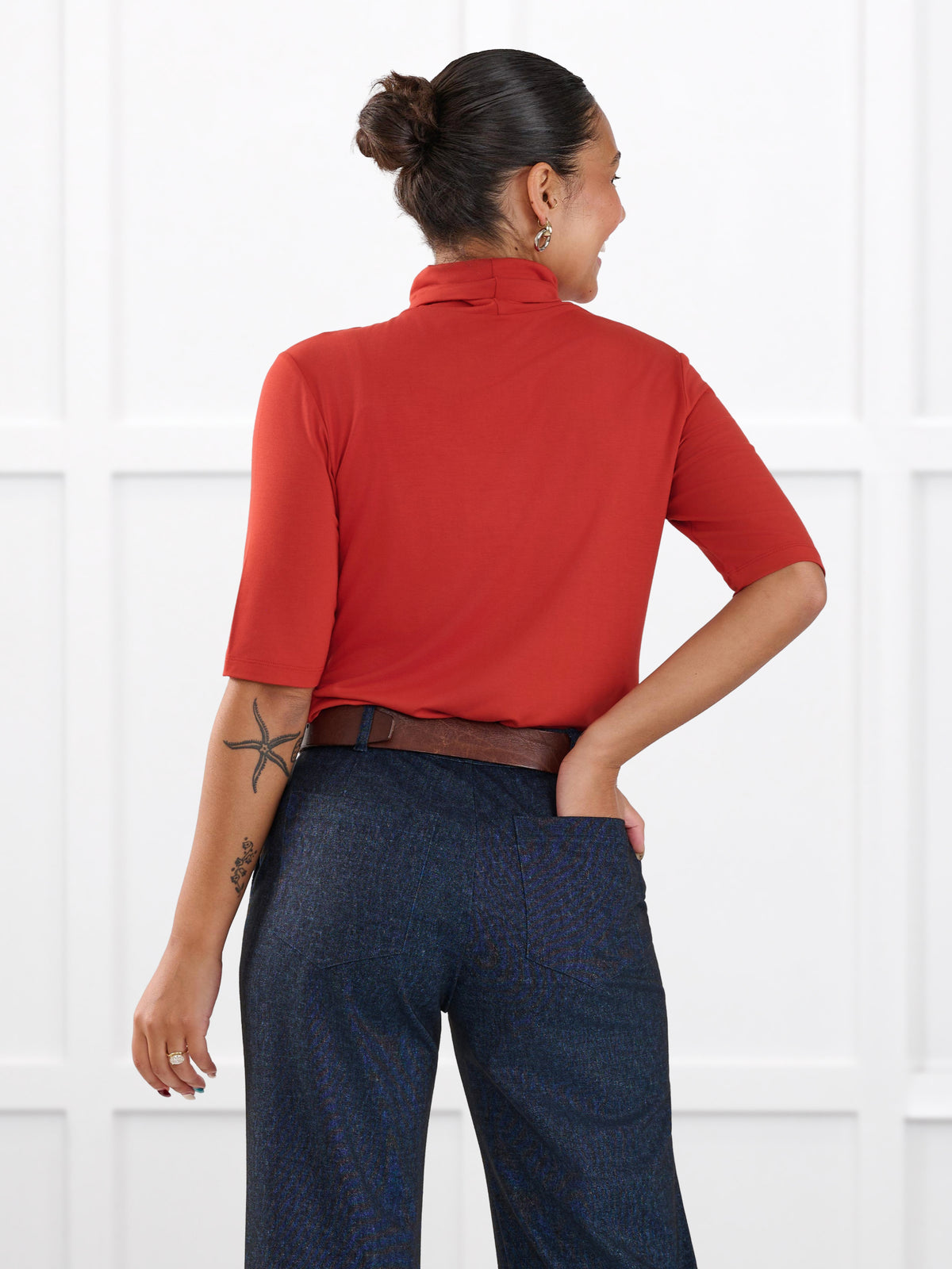 Halima half sleeve turtleneck top for women in Terracotta on model Meron, size XS @Meron-XS