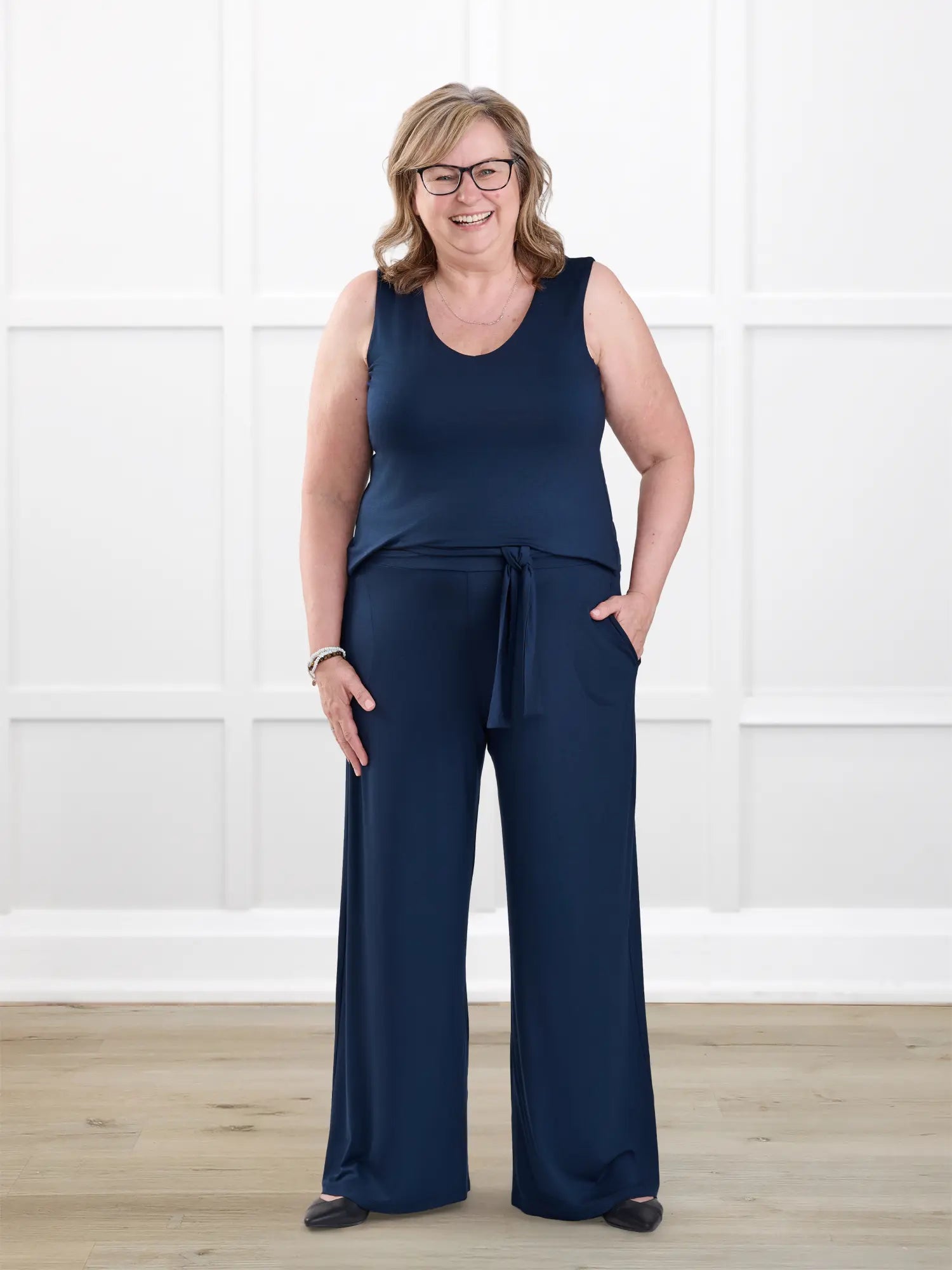Janelle open back wide leg jumpsuit for women in Navy on model Deb, size XL Regular @Deb-XL-regular