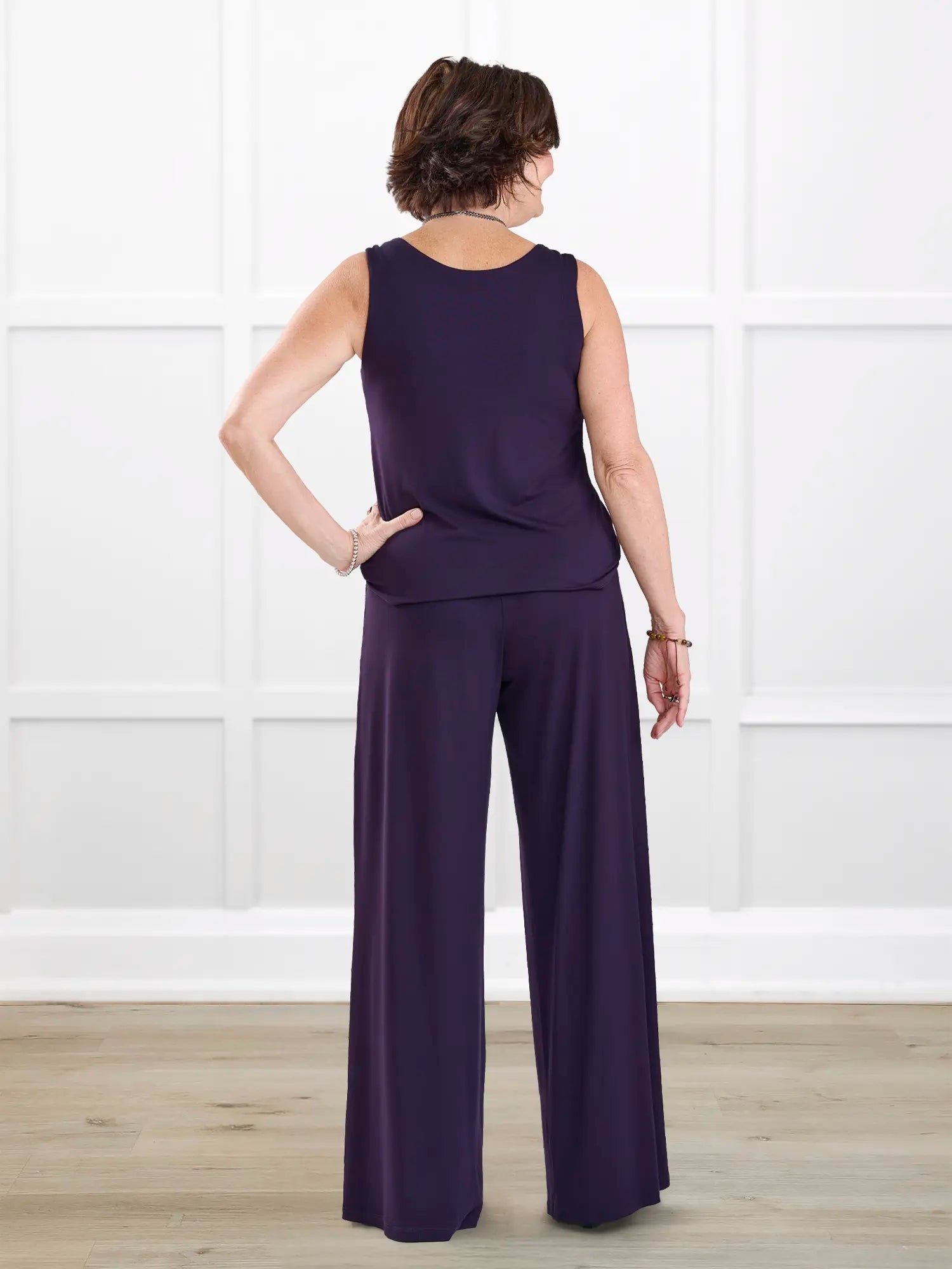 Janelle open back wide leg jumpsuit for women in Aubergine on model Donna, size S Regular @Donna-S-regular