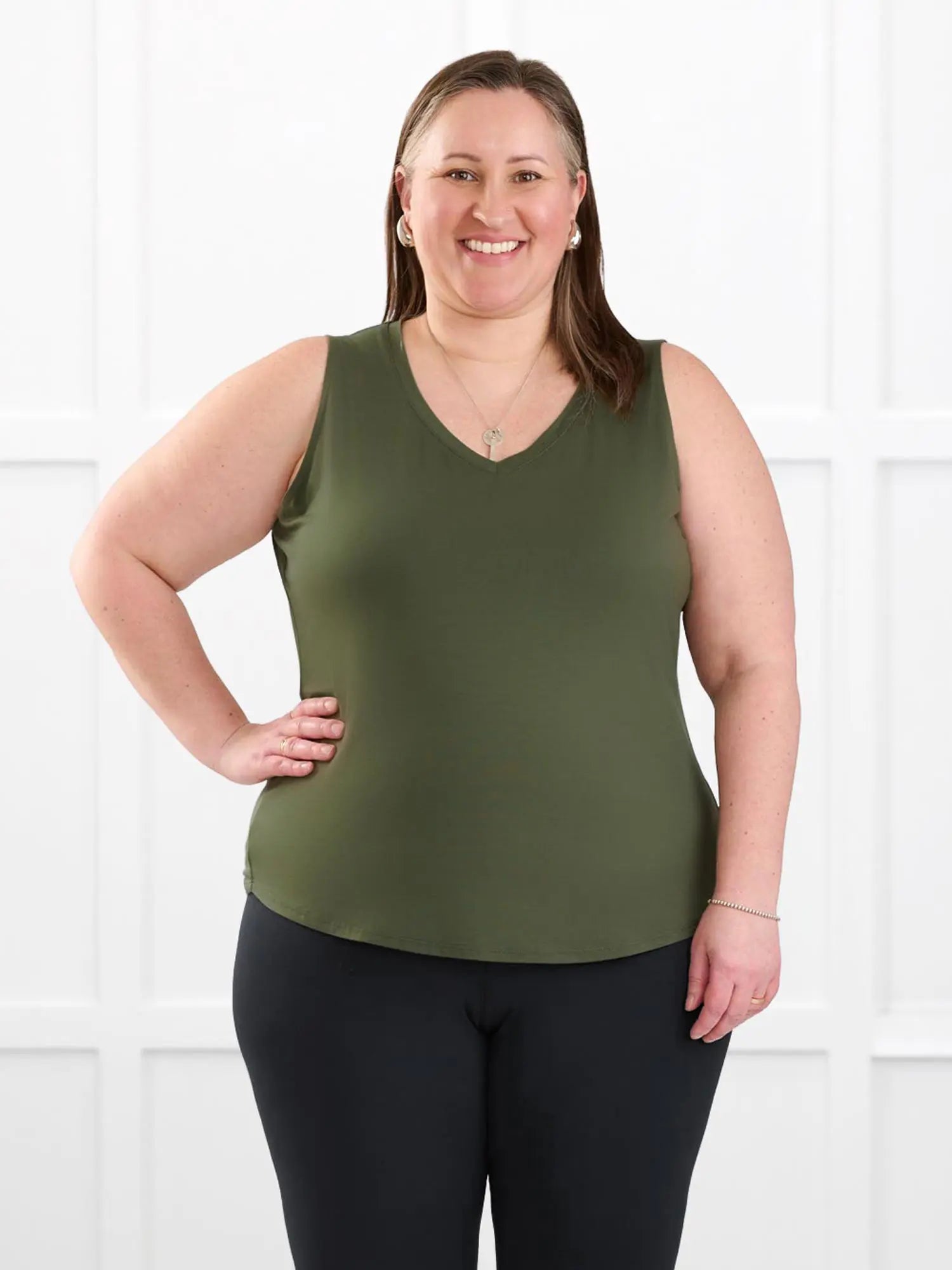 Jules v neck sleeveless top for women in Cactus green on model Cristina, size XXL @Cristina-XXL