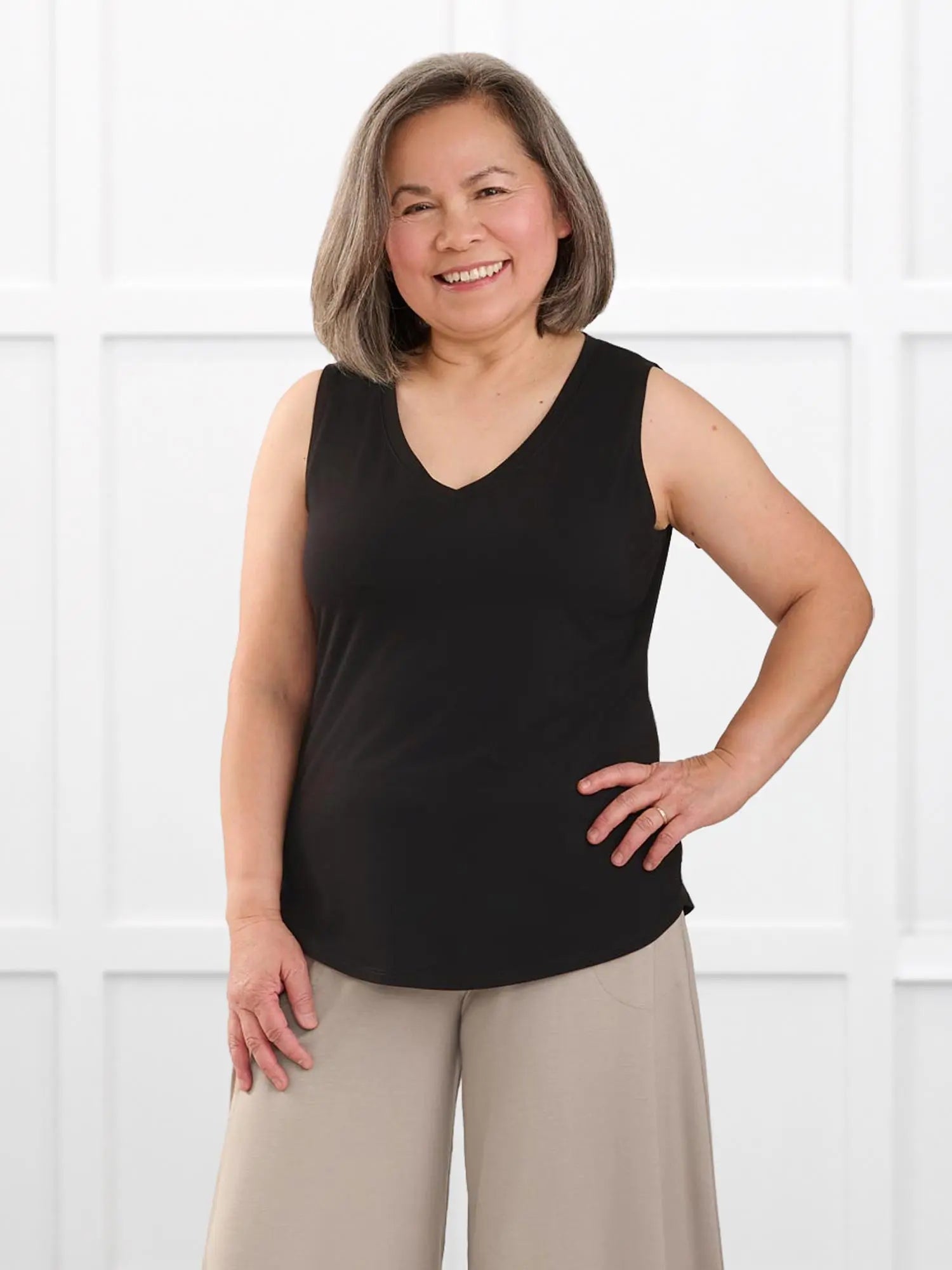 Jules v neck sleeveless top for women in Black on model Terry, size S @Terry-S