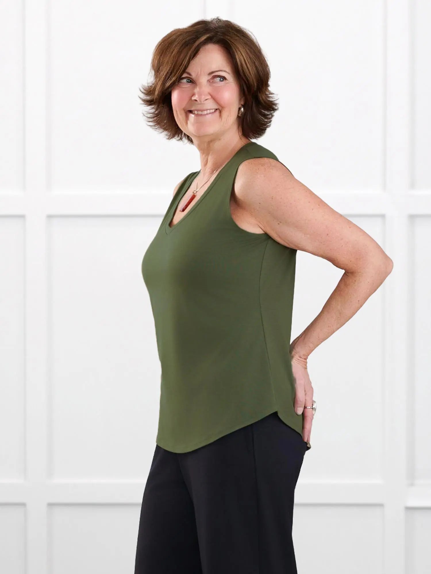 Jules v neck sleeveless top for women in Cactus green on model Donna, size S @Donna-S