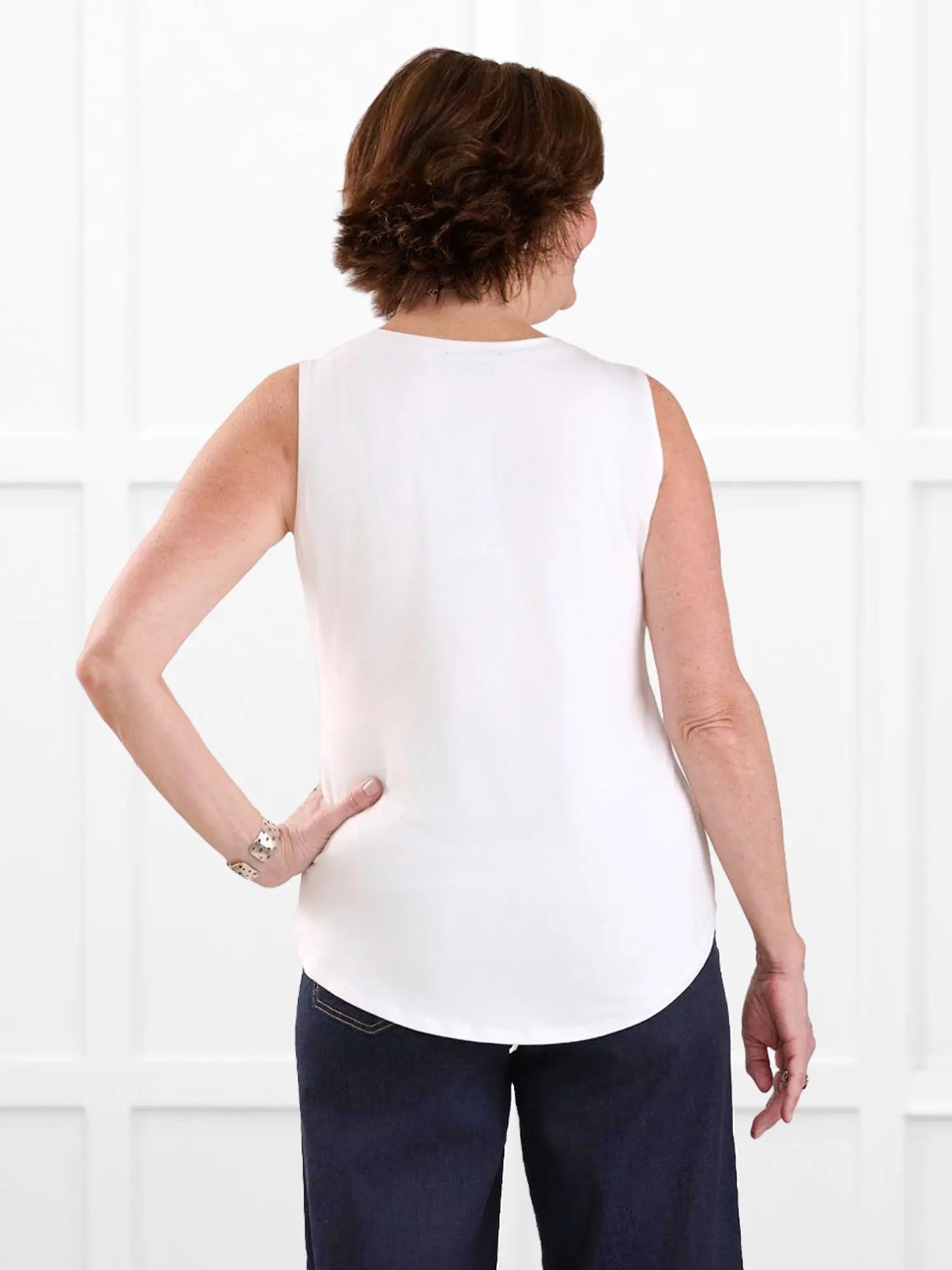 Jules v neck sleeveless top for women in White on model Donna, size S @Donna-S